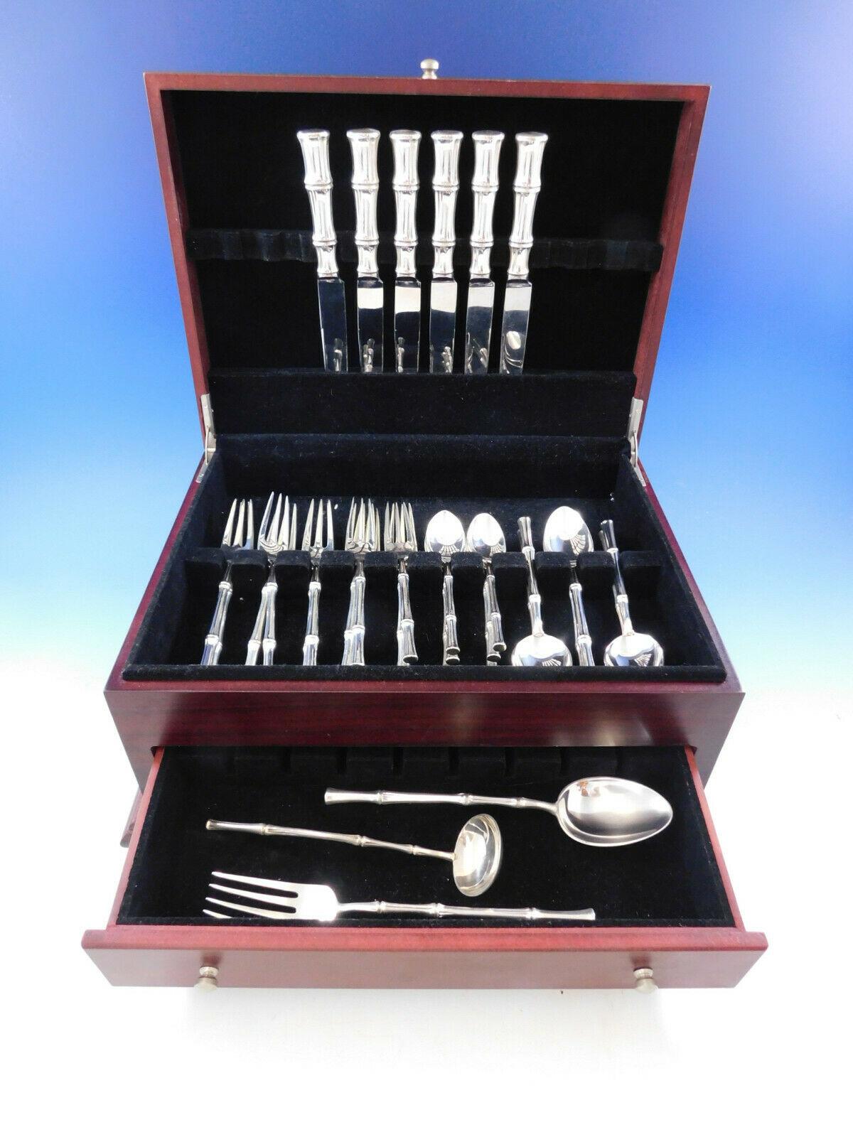 Dinner size bamboo by Tiffany and Co. sterling silver flatware set, 33 pieces. This set includes:

6 dinner knives, 9 3/8