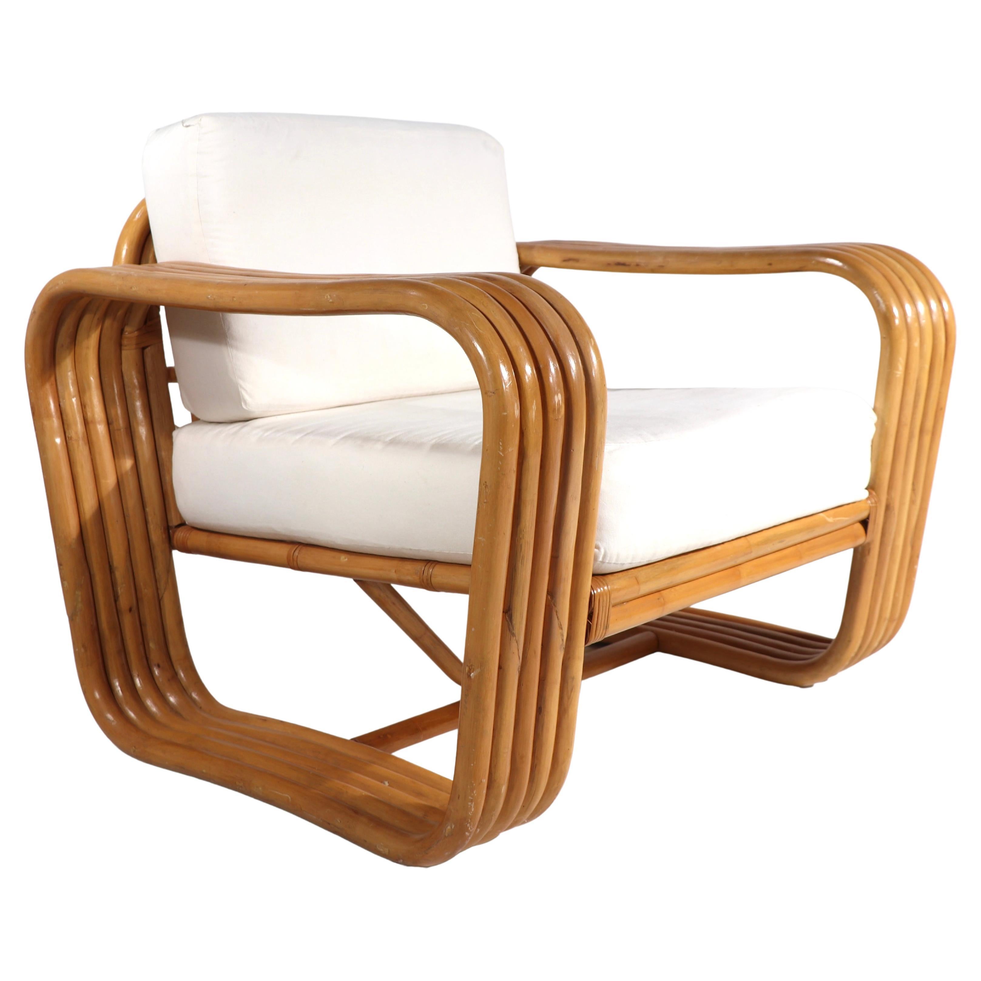 Stylish Mid Century bamboo lounge chair having 5 band thick - 7 inch W arms. The chair is in very good clean, original condition, showing only light cosmetic wear, normal and consistent with age. The cushions are in muslin, ready for your fabric.