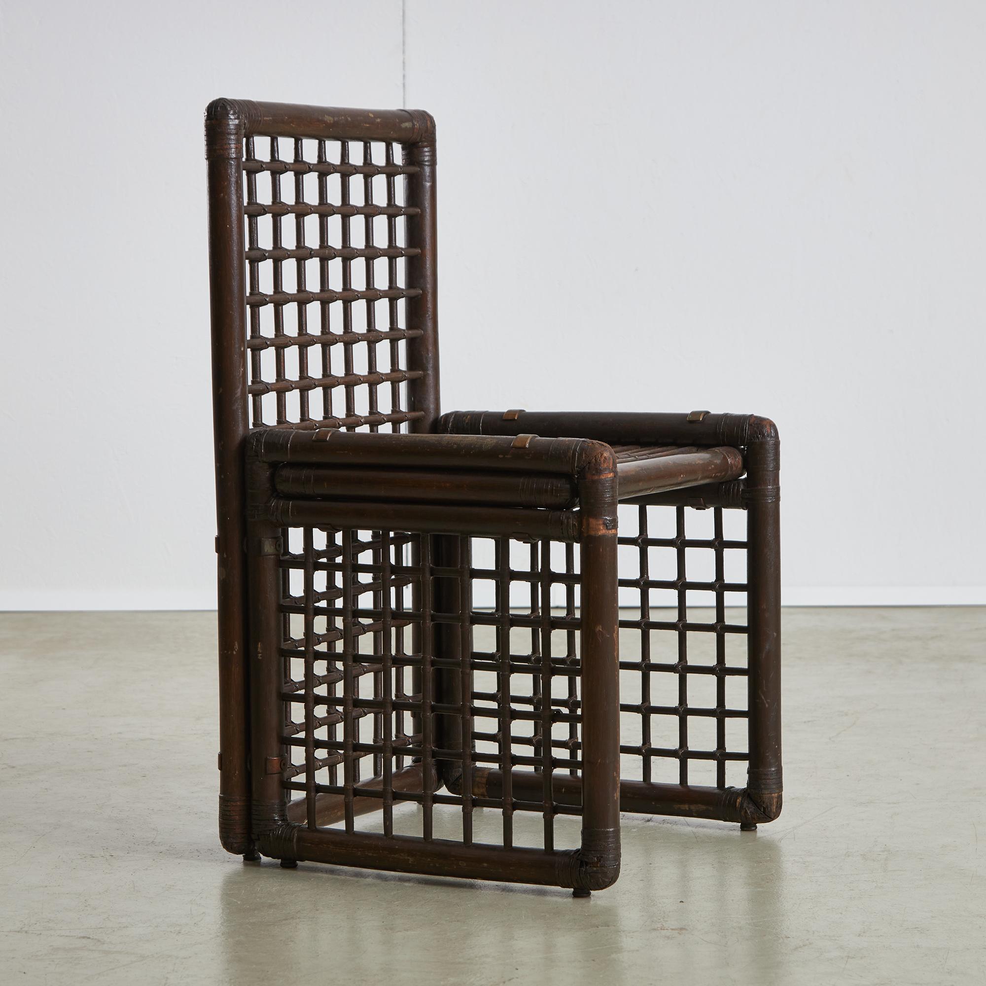 Afra e Tobia Scarpa square lattice bamboo chair in dark brown-red colour with elegant copper details. Designed in the Basilian I Series for B&B Maxalto in the 1970s. The chair remains fully functional and visually appealing. Signs of wear and tear