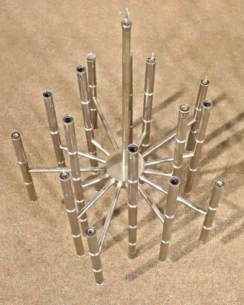 Polished chrome chandelier in a bamboo style. Candelabra base sockets on both sides for up and down lighting.
* 2 Available *
Please confirm location.