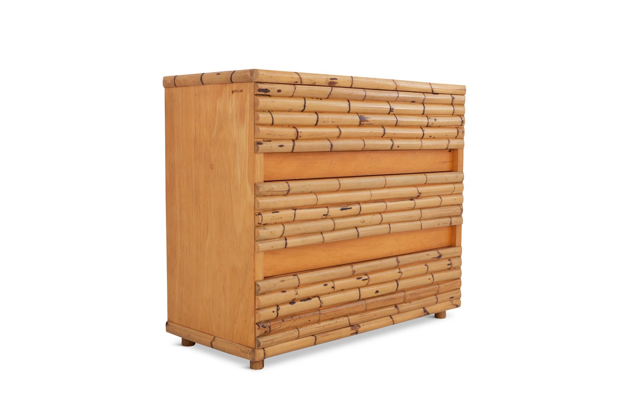 Hollywood regency mid-century modern Bamboo chest of drawers designed by Italian architect Venturini from Florence.  High quality piece made out of 3 larger drawers, finished with Bamboo.  

Would work well in a Gabriella Crespi inspired tropical