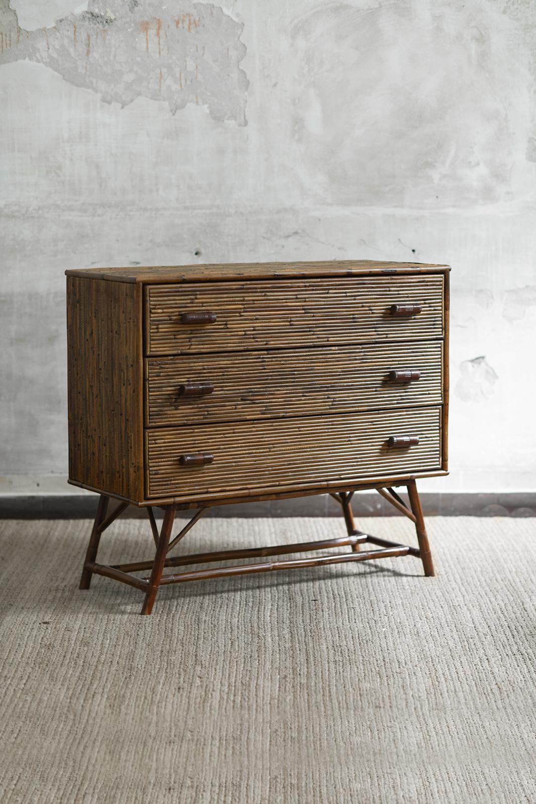 Bamboo chest of drawers with leather bindings.
Product details
Dimensions: 104w x 94h x 46d cm
Materials: bamboo, leather.
Italian craftsmanship