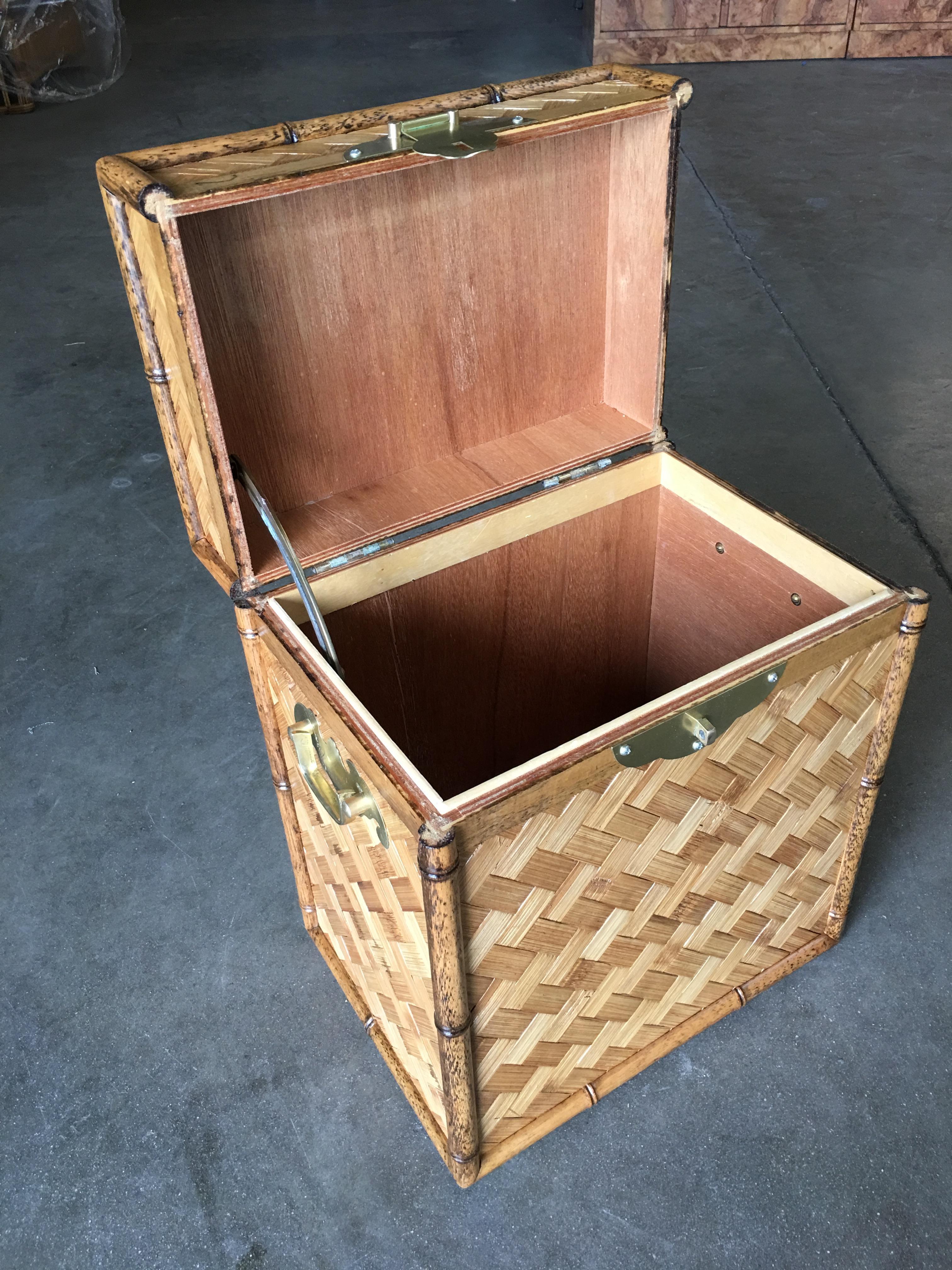 This bamboo storage trunk with woven wicker cover and solid cedar inner walls also comes with a unique copper face lock in the front. Restored to new for you. All rattan, bamboo and wicker furniture has been painstakingly refurbished to the highest