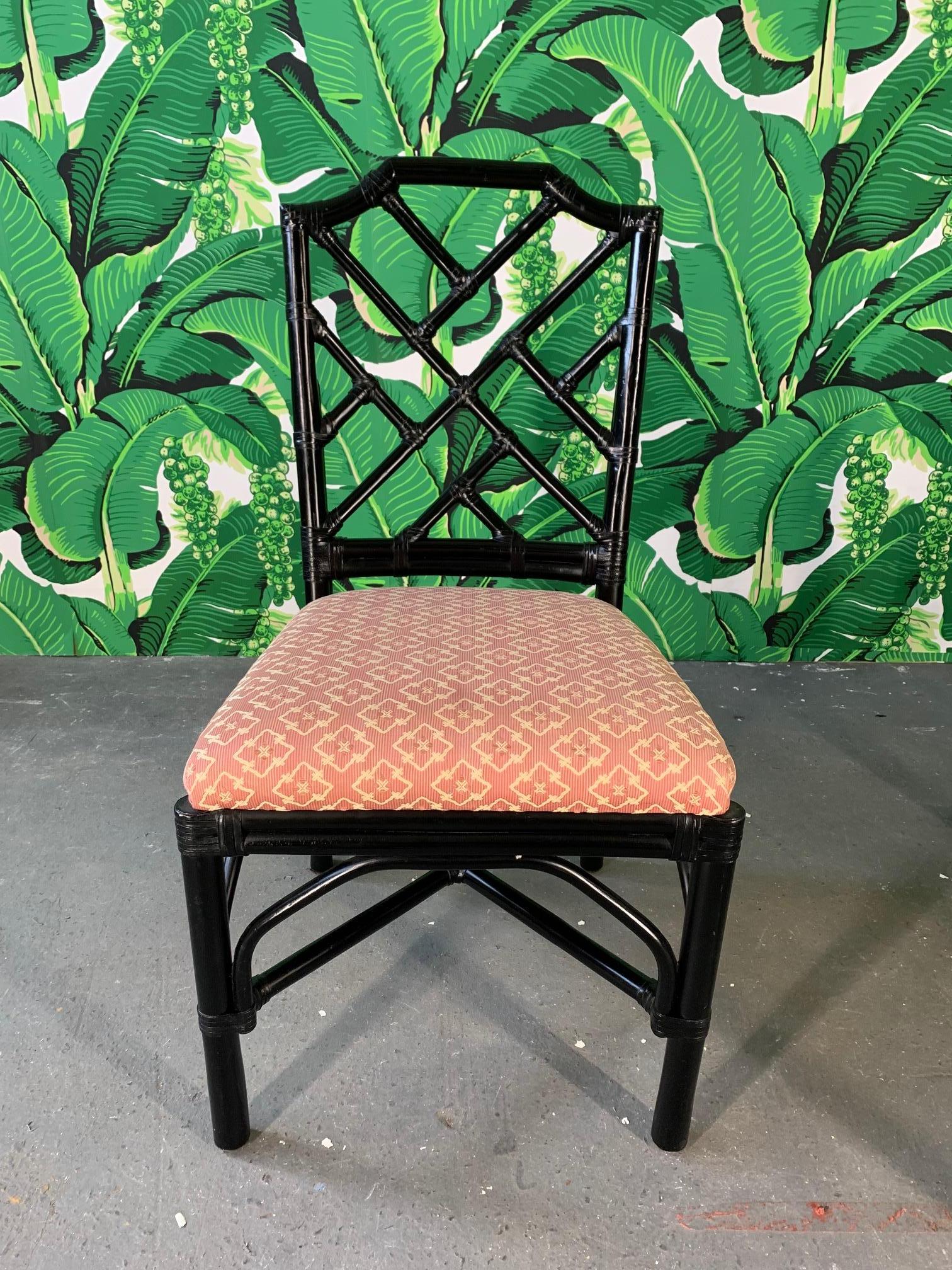 Black lacquered set of six Palecek bamboo dining chairs in Chinese chinoiserie style. Excellent condition both structurally and cosmetically. Set consists of two armchairs and six side chairs.
Very good condition with only very minor imperfections