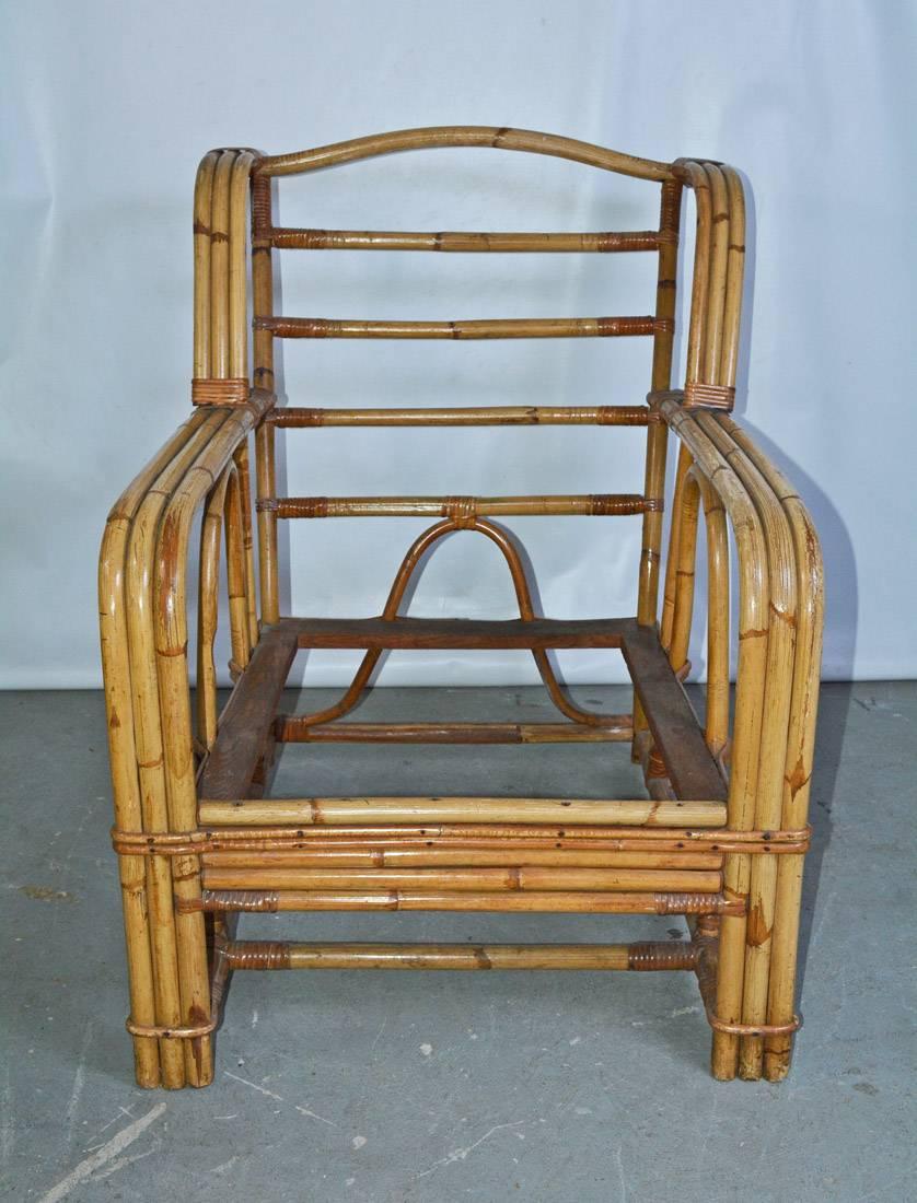 Vintage bamboo lounging armchair with beautiful lines and clean wicker or rattan like design.
Arm height: 22.50