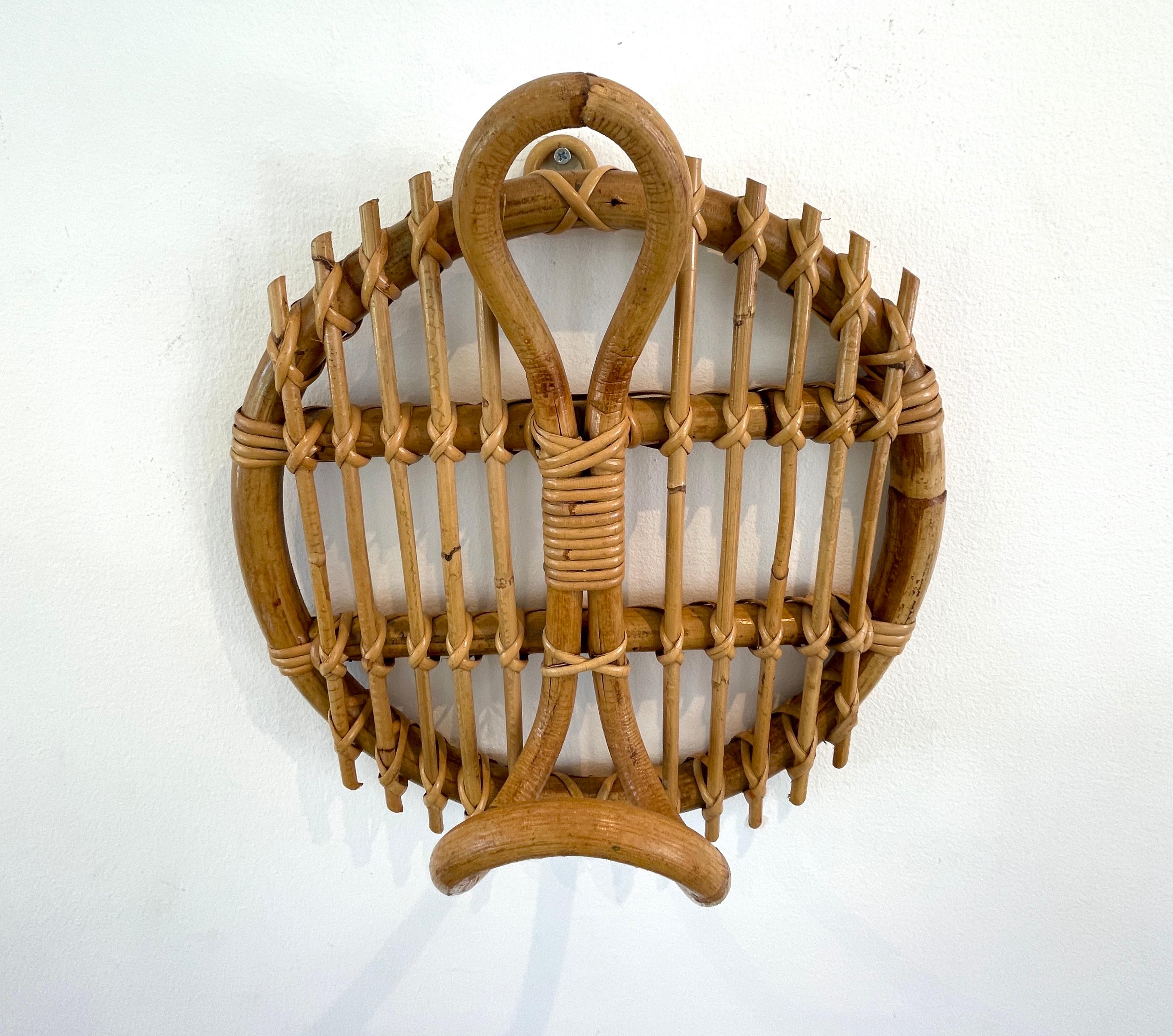 Oversized bamboo and rattan coat hook.
Italy, circa 1950's.
Multiple available.