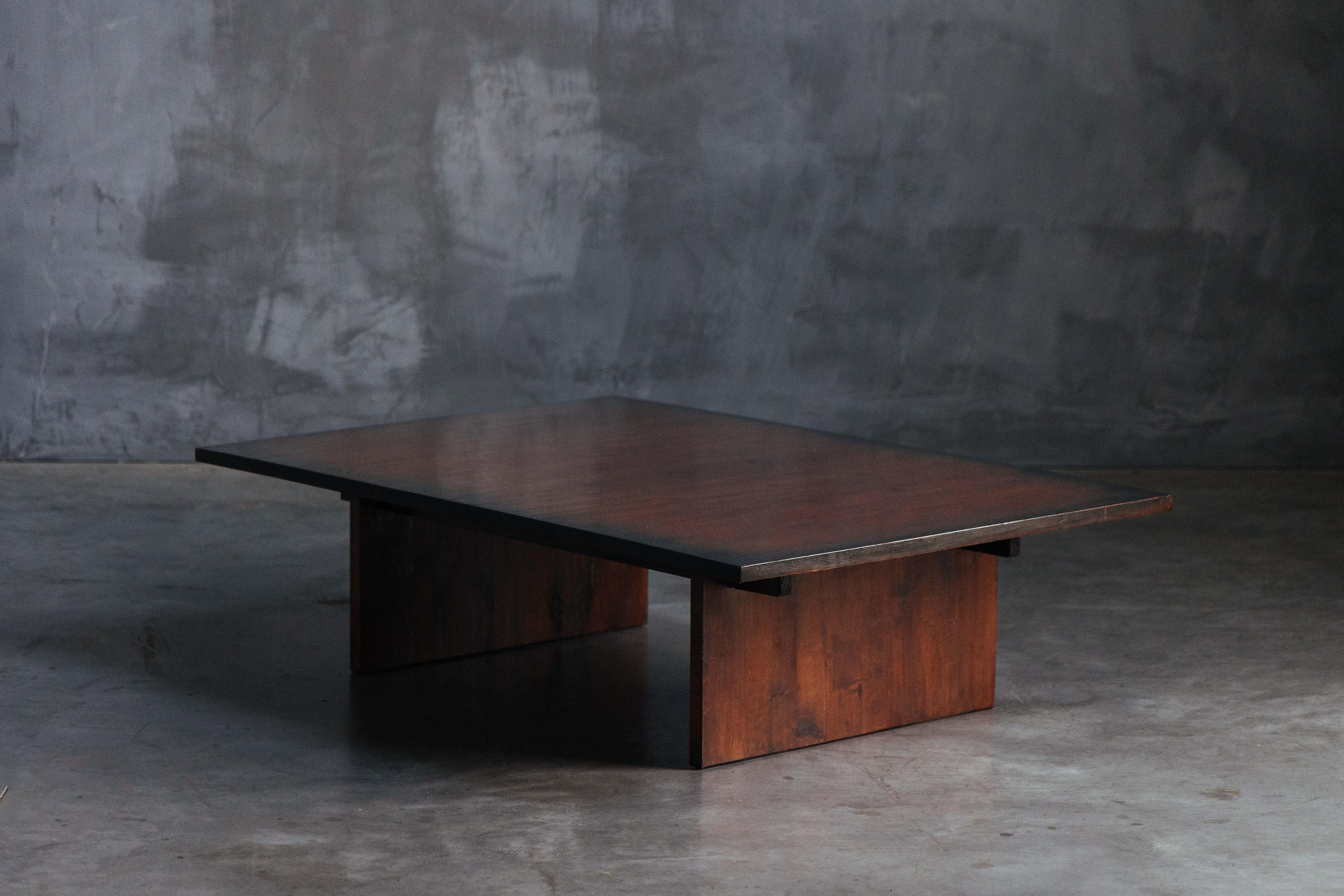 Coffee table by Axel Vervoordt, a visionary Belgian decorator and art dealer. Crafted in the 1980s, this exceptional piece showcases Vervoordt's unparalleled design prowess. Constructed with a combination of rich wenge wood and bamboo, this coffee