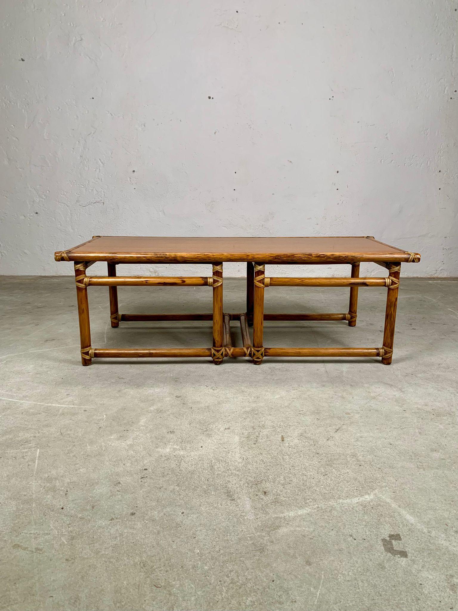 Bamboo coffee table by Lyda Levi, McGuire production
USA, 1970s
Dimensions: 127 x 55 x 43 cm
Frame entirely in bamboo with natural finish, featuring characteristic knots and weaving typical of the material. Lightweight and sturdy design,