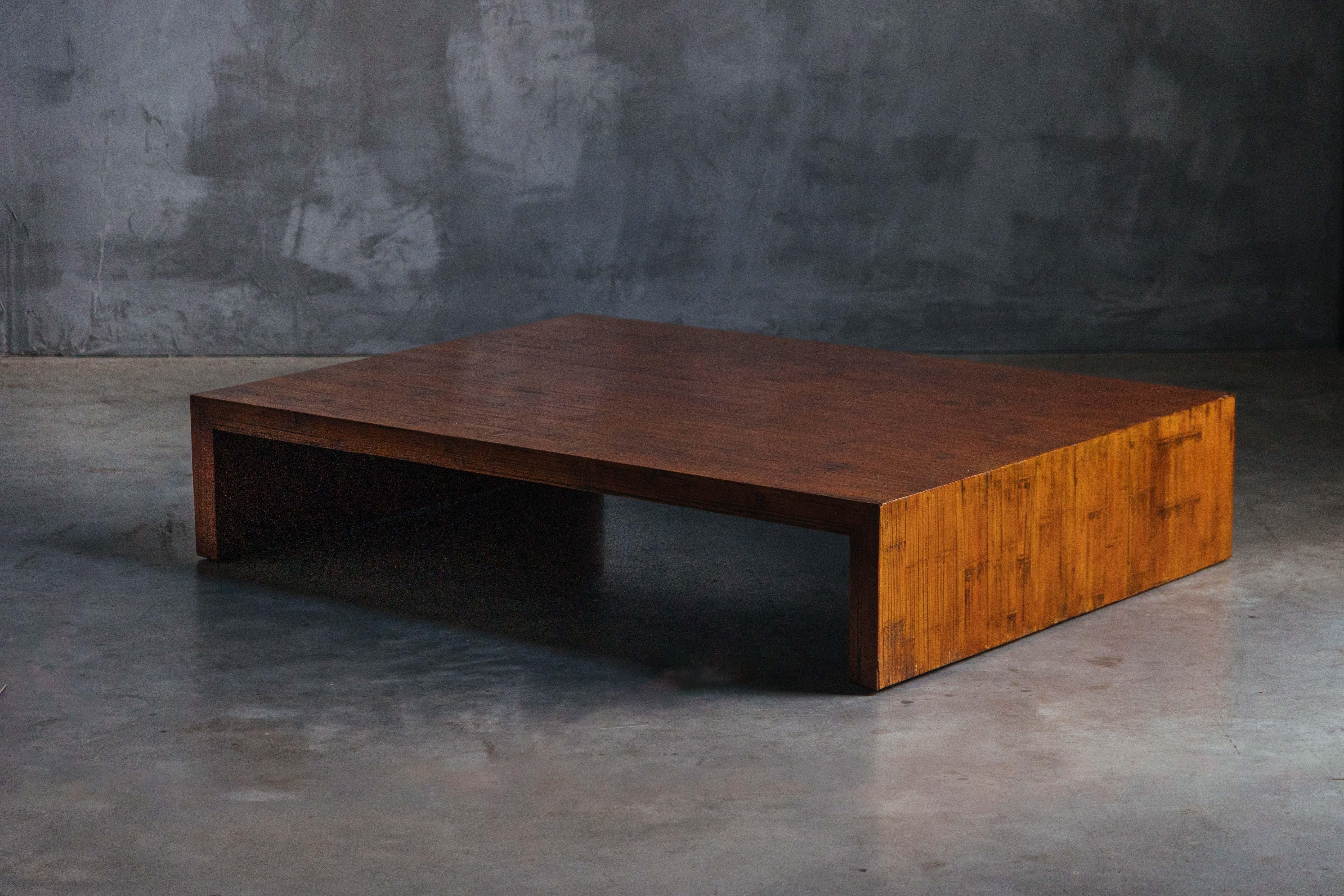 Bamboo coffee table, crafted in the 1980s in the style of Axel Vervoordt, exudes timeless elegance through its natural materials and minimalist design. Embracing the wabi-sabi philosophy, the table highlights organic textures and imperfections,