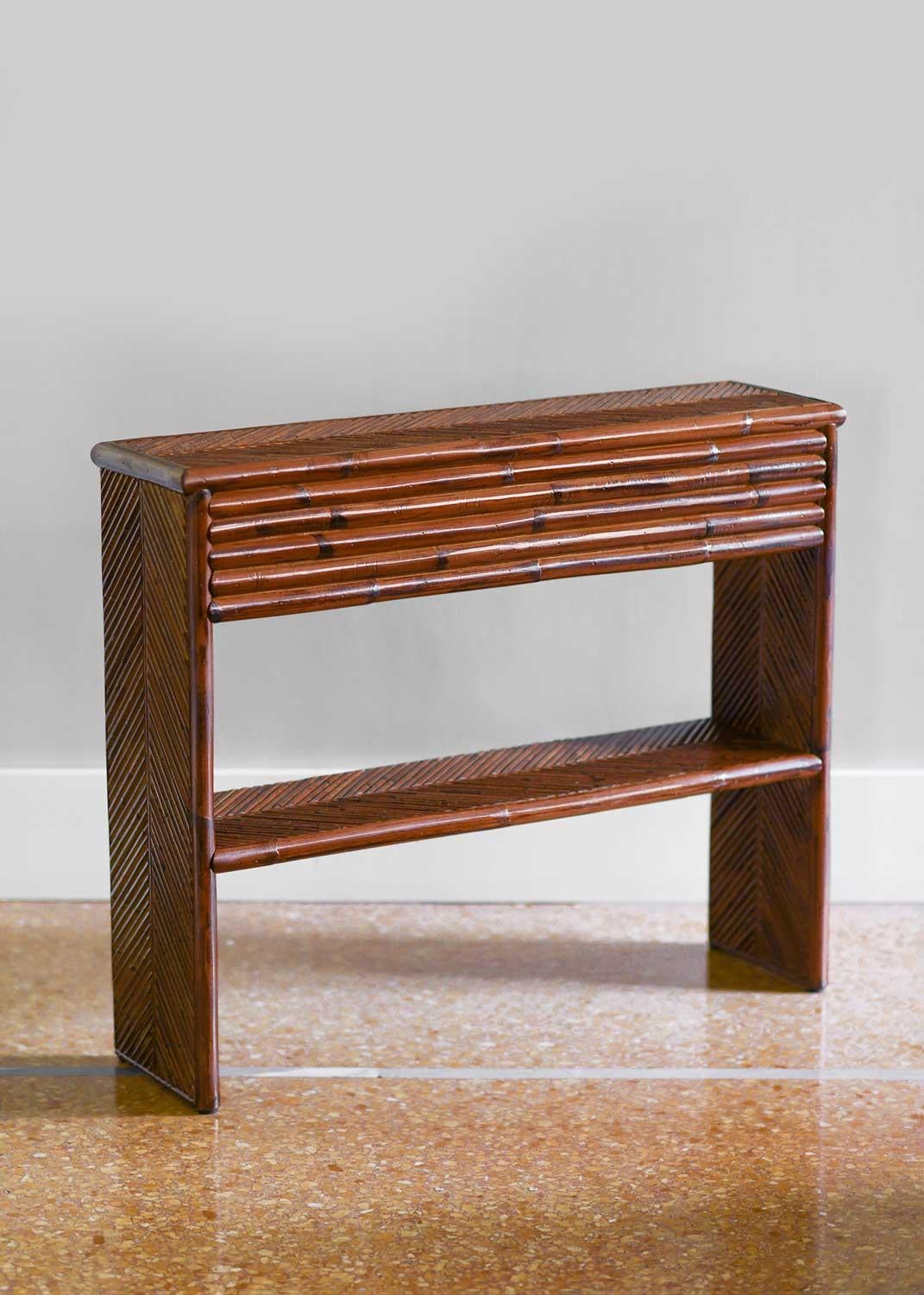 Bamboo console with shelf Edizioni Molto
Product details
Italian artisanal production
Dimensions: 90L x 75H x 24D cm
Other dimensions available upon request.