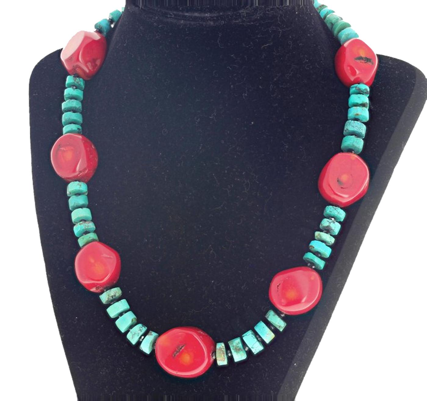 Beautiful polished rounded chunks of natural red Bamboo Coral enhanced with polished slices of natural bluish/greenish Turquoise accented with sparkling gem cut black Spinel set in a 17 inch long necklace with Sterling Silver hook clasp.  This