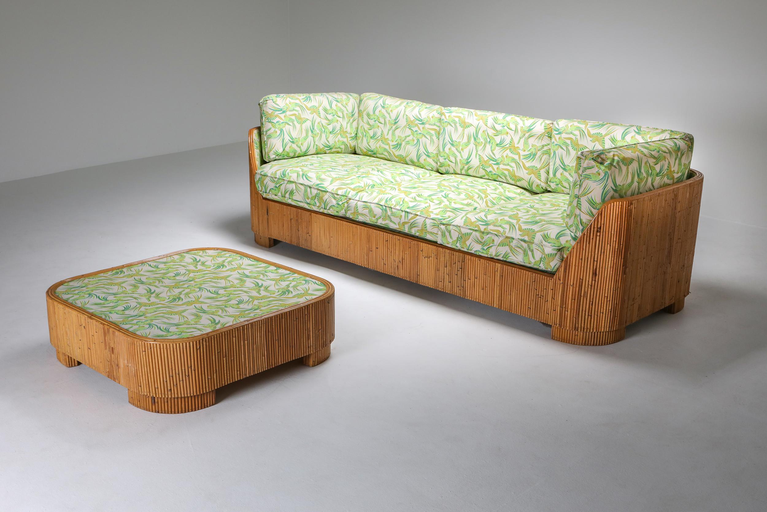 Vivai del Sud bamboo couch, 1970s, Italy.

Well-matched contrast between the raw bamboo base and soft floral fabric.
Would fit perfectly in a Hollywood Regency style interior.

Measurements: W 230, D 95, H 79, SH 43.

 