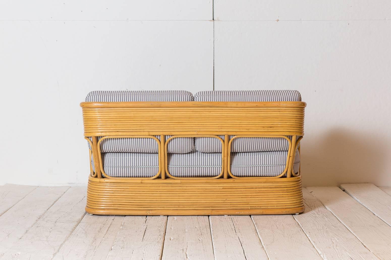 Mid-20th Century Bamboo Deco Curved Settee Upholstered in Blue and White Striped Ticking Fabric