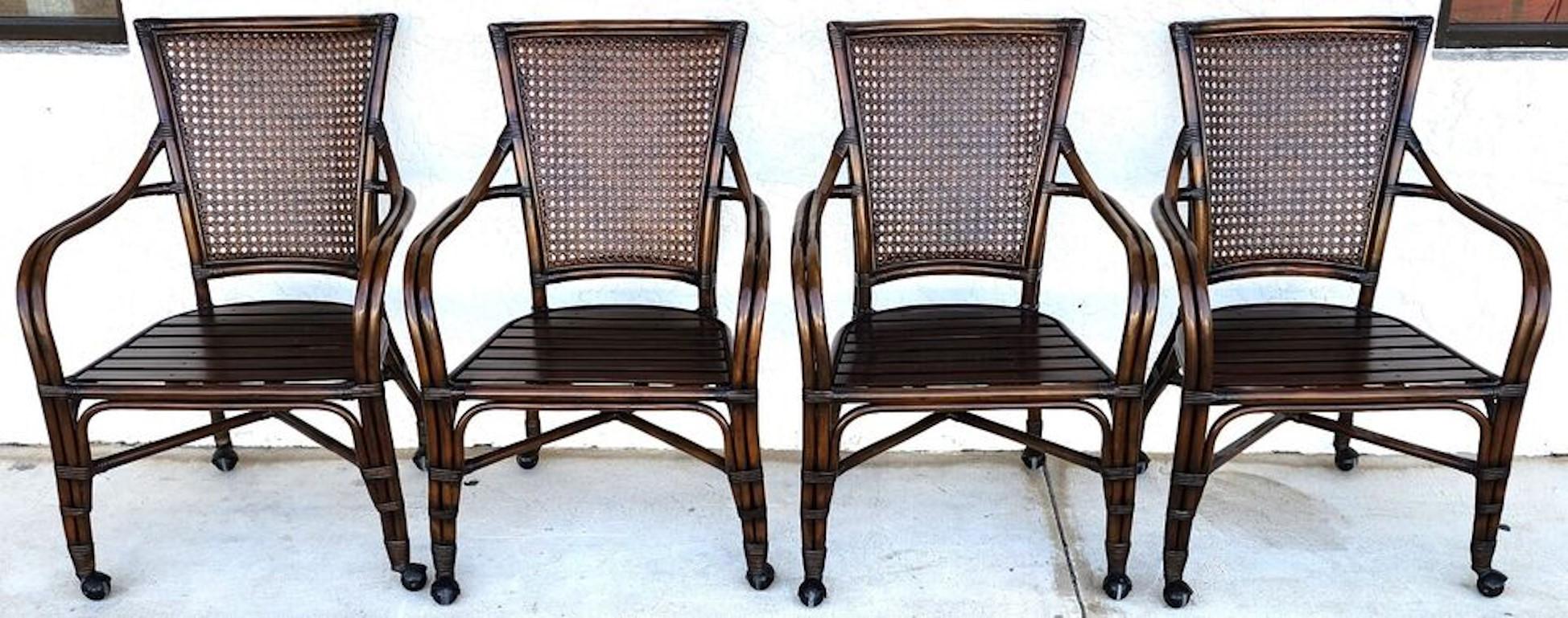 For FULL item description click on CONTINUE READING at the bottom of this page.

Offering One Of Our Recent Palm Beach Estate Fine Furniture Acquisitions Of A
Set of 4 Caned Back & Rolling Bamboo Dining Chairs
These are very well made and sturdy