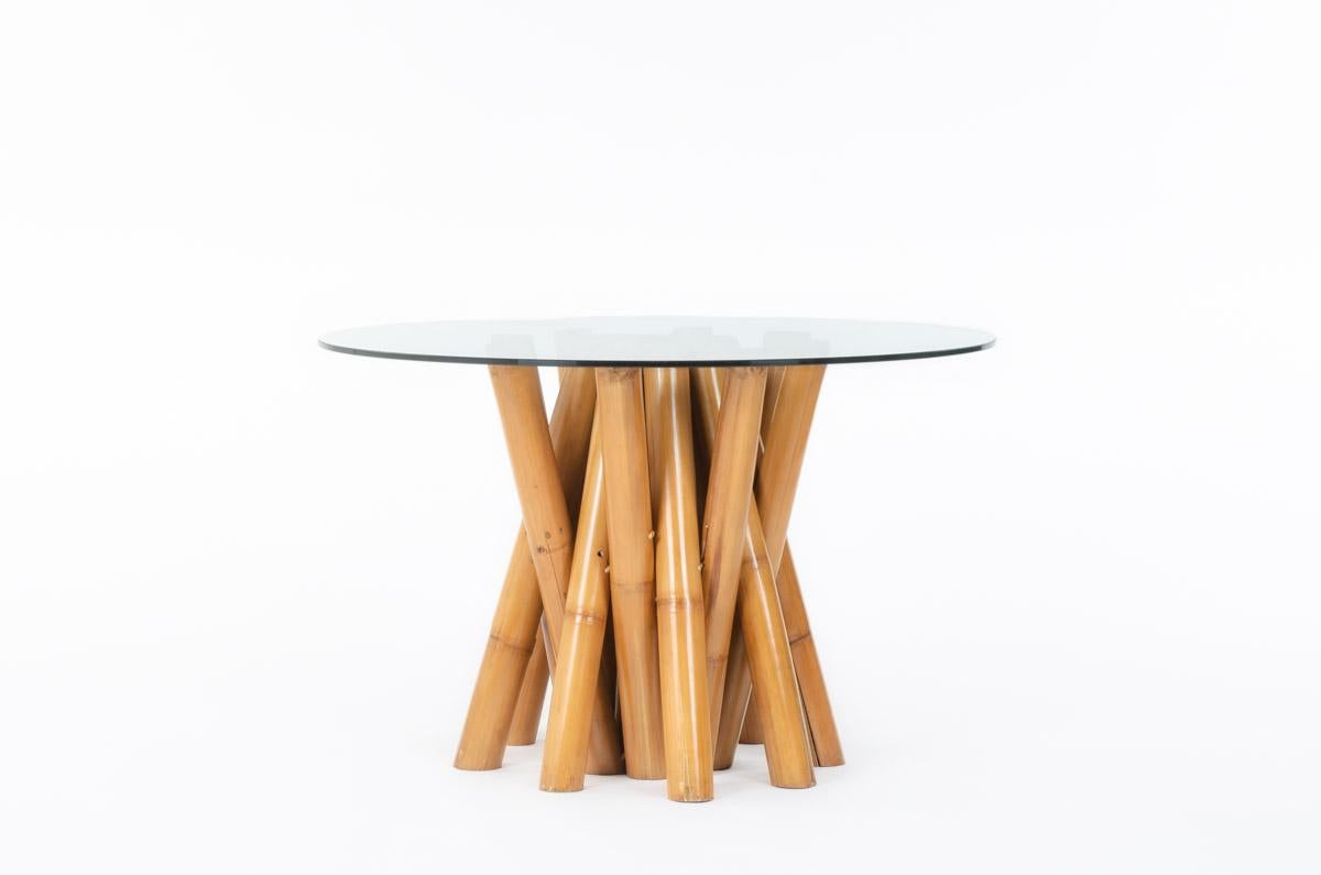 Dining table made in the seventies in France
Base in bamboo, top in glass
Good vintage condition
To note: one impact on the top (see picture).