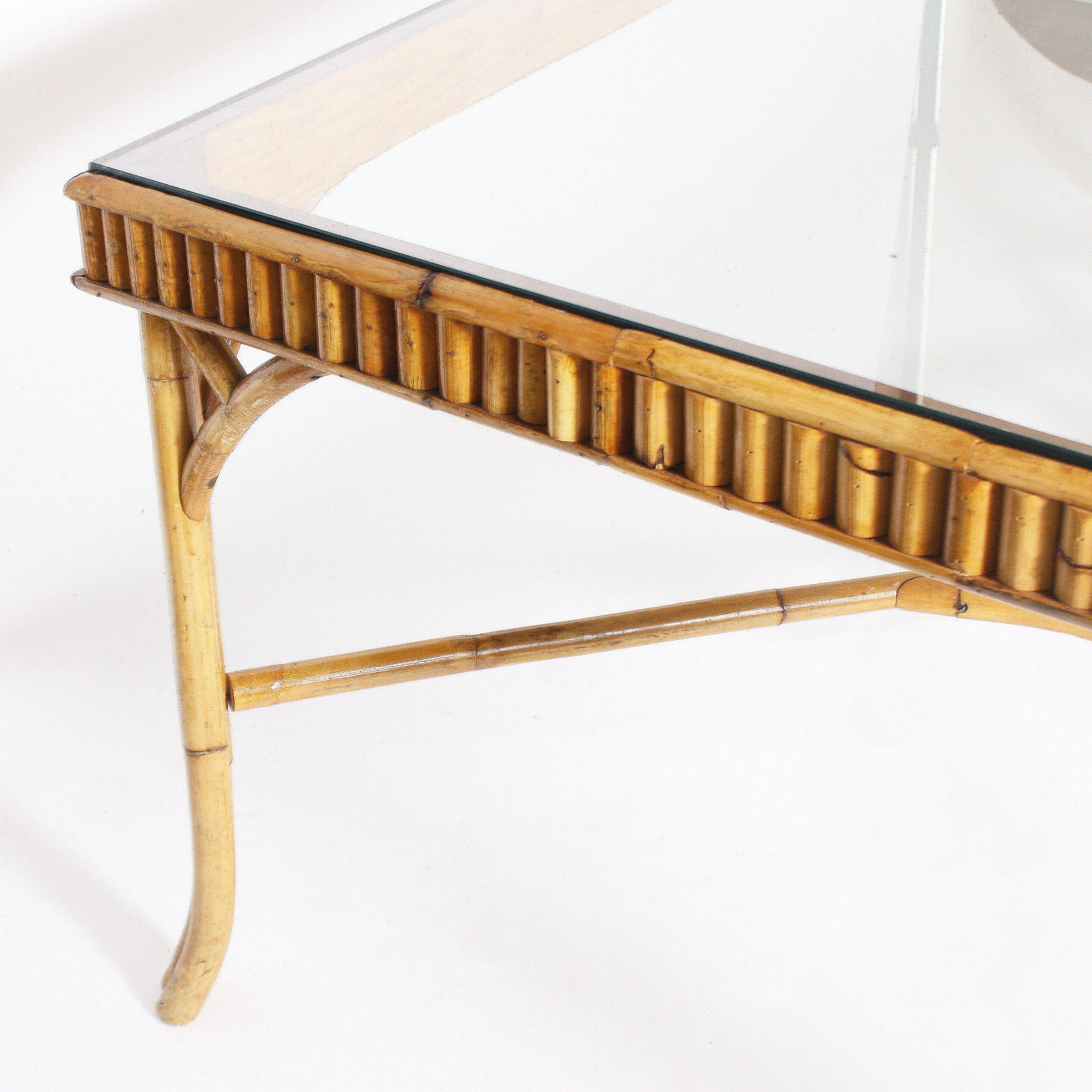 Bamboo dining table, circa 1960.
Measures: 73” W X 43 1/2” D X 28 3/4” H.