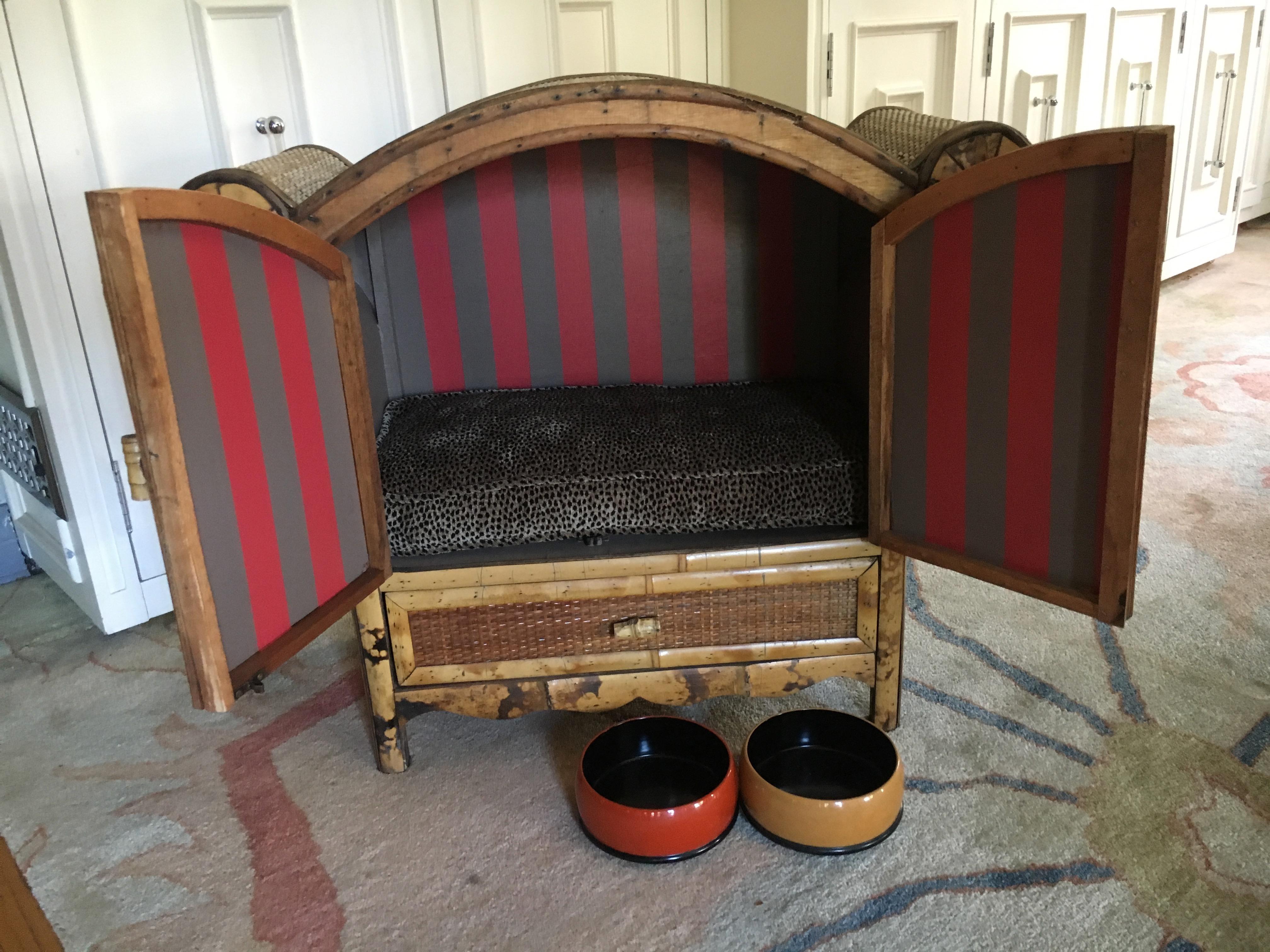 Once a small bamboo cabinet, we have modified the interior by adding painted stripes and a custom 