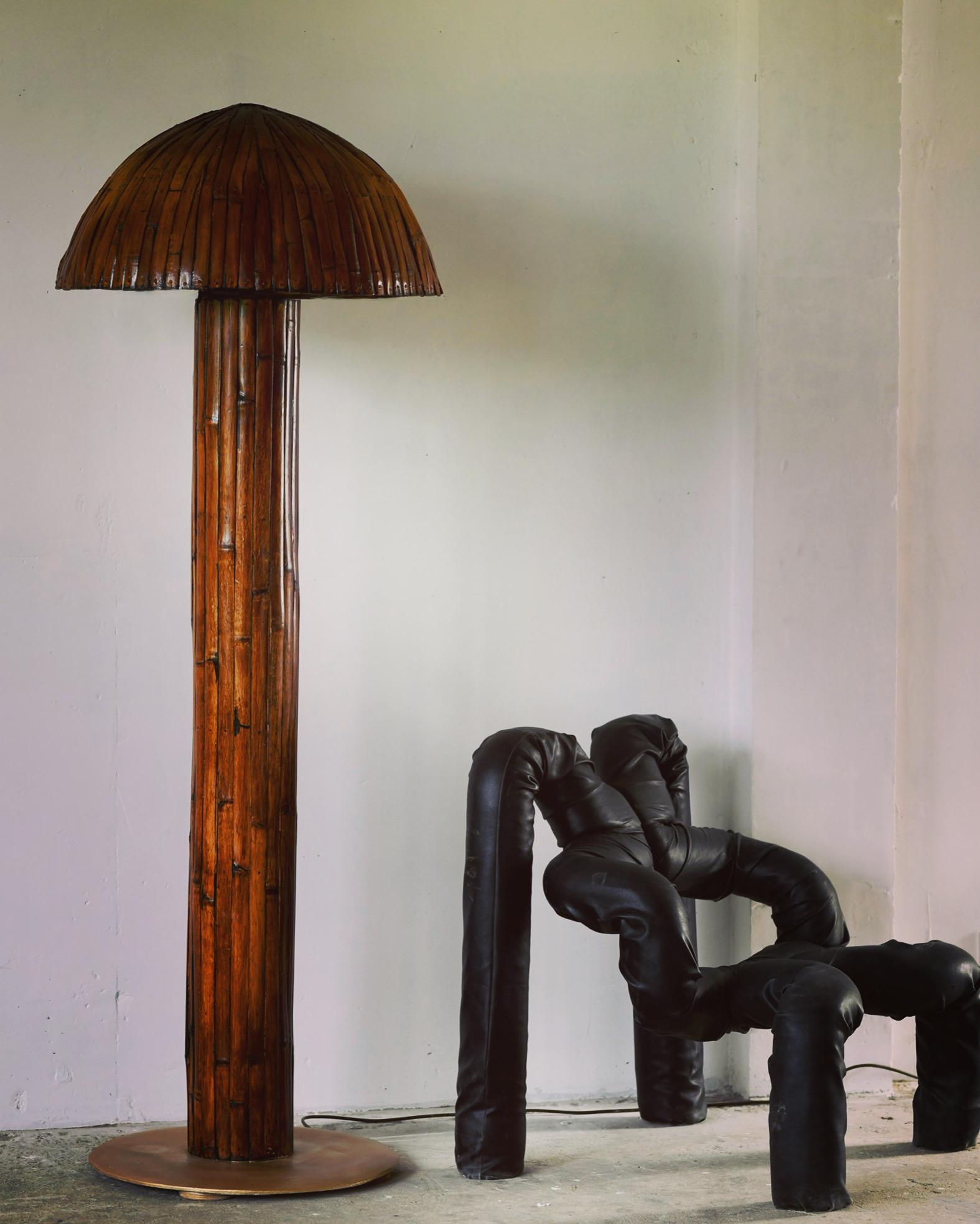 Patinated bamboo floor lamp with a fabulous texture golden round base with a patinated mushroom shape shade. Post modern in style Bauhaus influences. Substantial piece for a substantial installation.

We can customise this piece to suit your