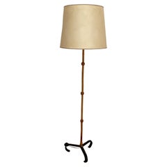 Bamboo floor lamp by Jacques Adnet tripod base in black metal