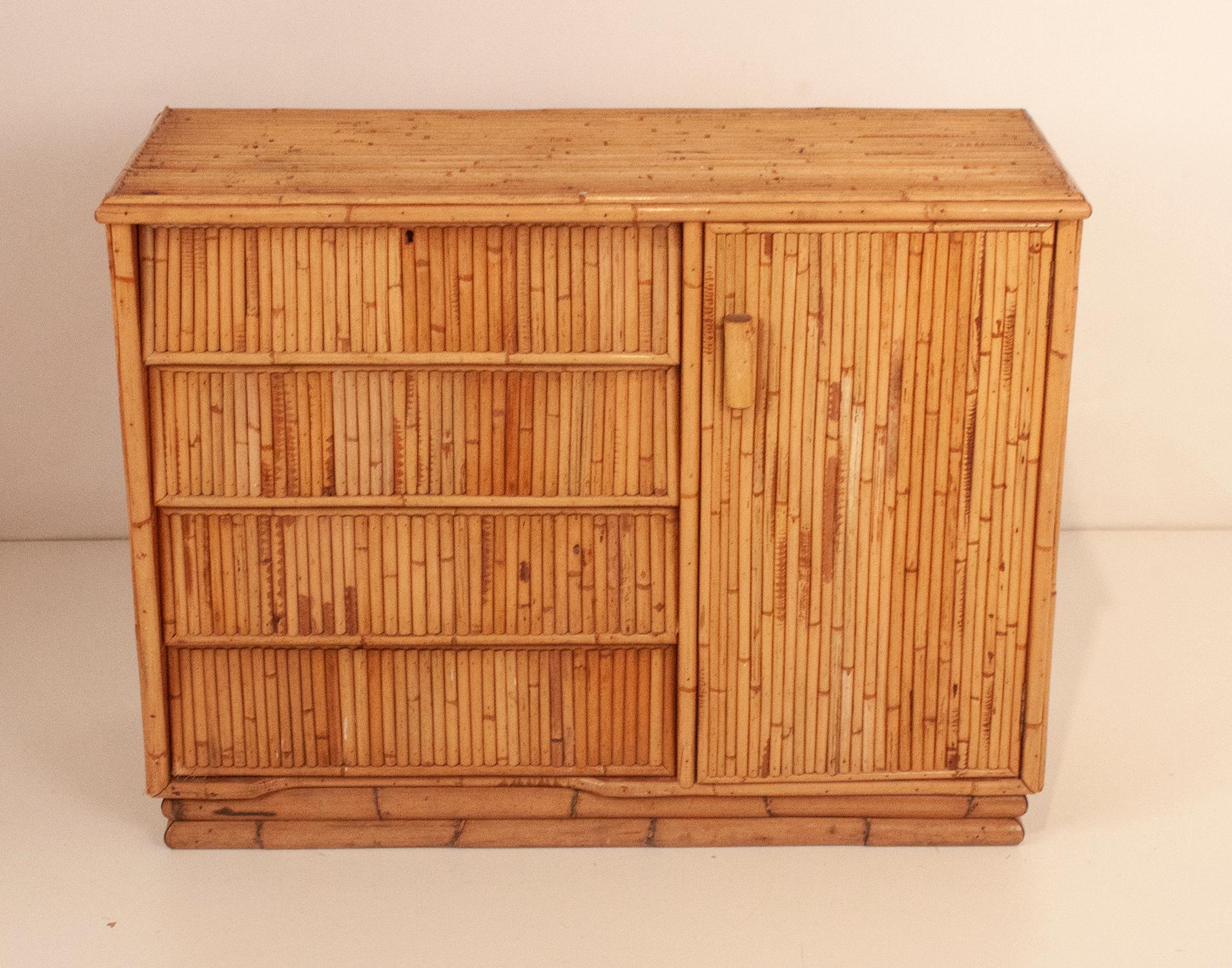 Furniture- Spanish bamboo chest of drawers with 4 drawers and a side door.
Very decorative.
Measures:
Width: 94cm ( 37,00 In)
Depth: 37cm ( 14,56 In)
Height: 72cm ( 28,53 In).

 