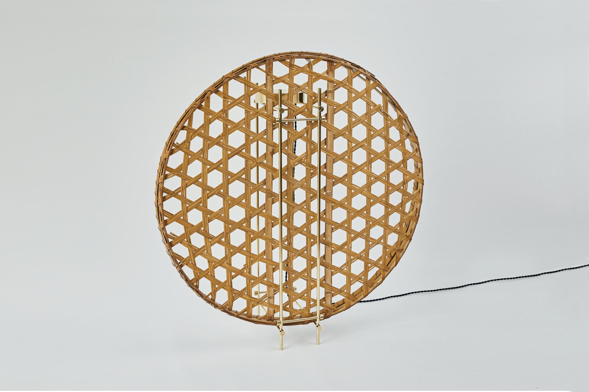 Lamp designed by Ryosuke Harashima.
This work is made of antique Japanese bamboo basket and brass.
Artist creates new style lamp by combining old tool which is never used now and Industrial materials. It has both contemporary feeling and folk craft