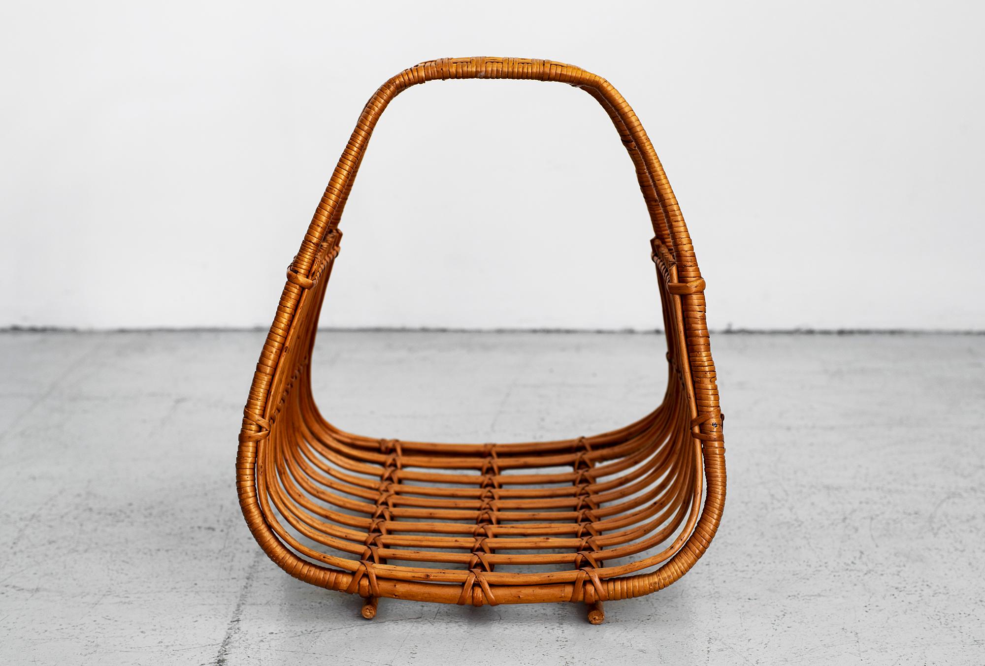 Sculptural French bamboo and wicker magazine holder.