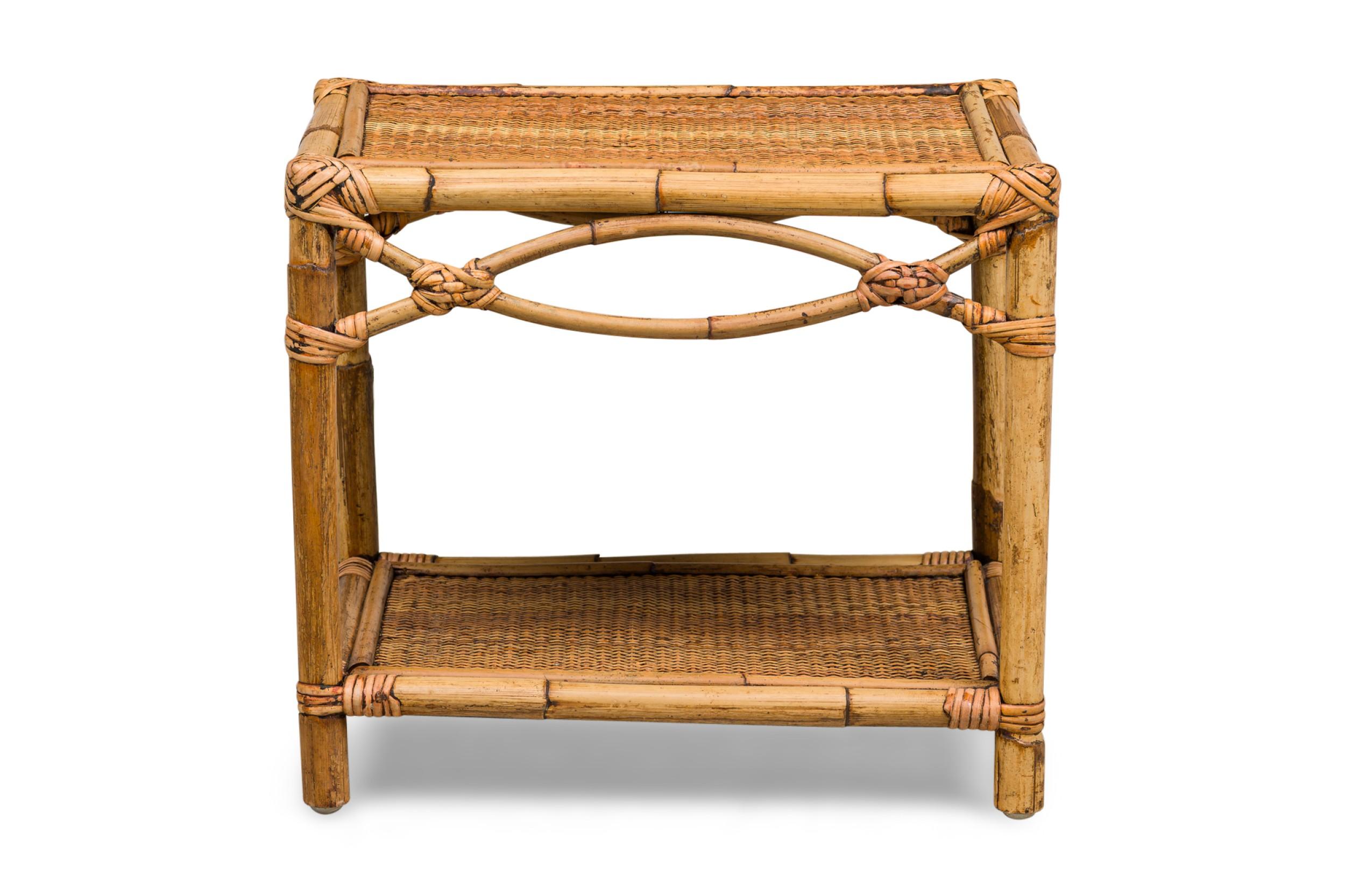 Bamboo Mid-Century small rectangular end / occasional table having a rattan top and shelf with a double helix apron