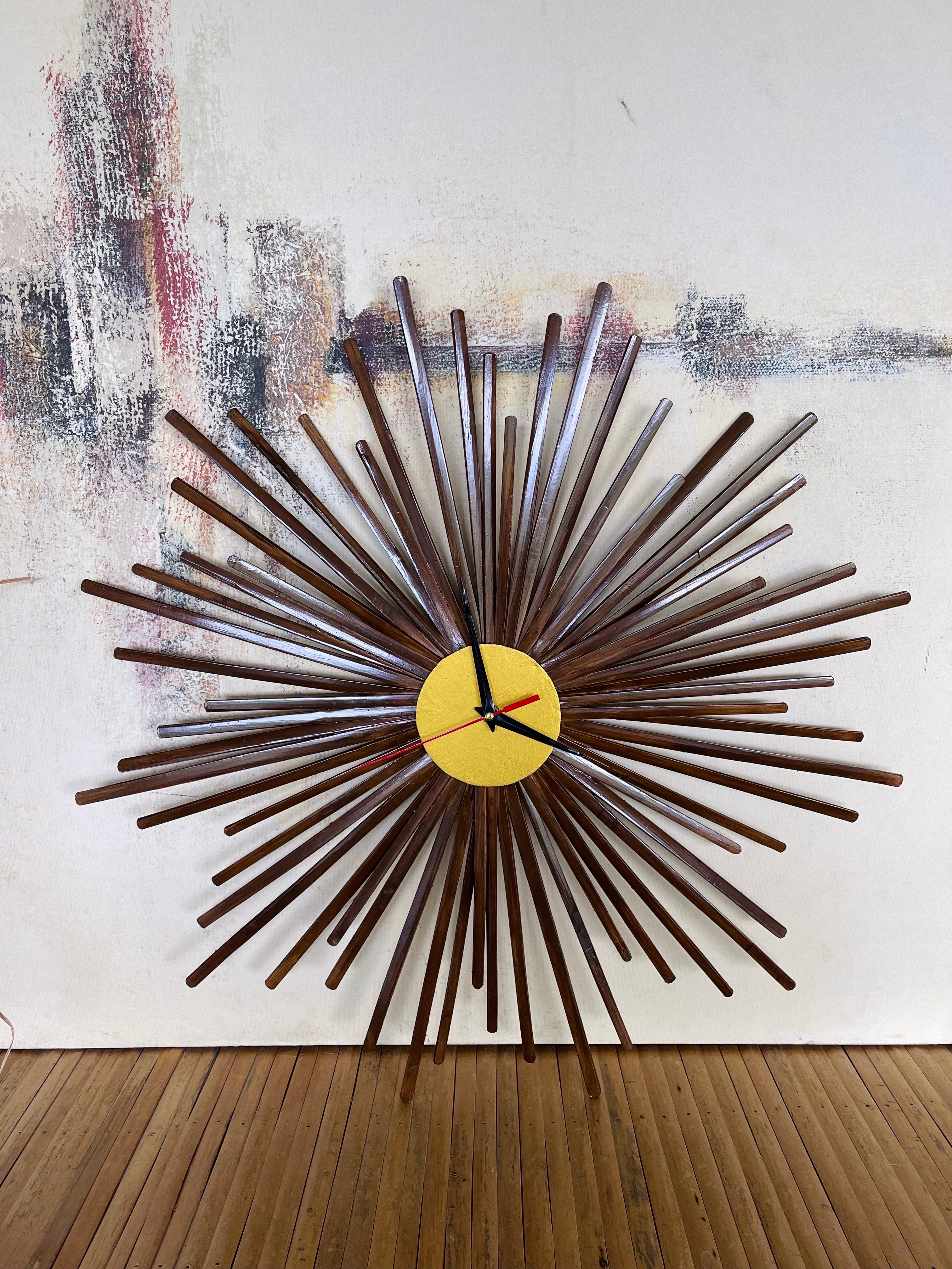 This is a High-quality Natural Rattan and Bamboo Mid Century style Starburst Clock Hand Crafted by local artisans in the Philippines

The clock measures 40cm in diameter

Organic Bamboo pieces with stain (All bamboo pieces were treated with