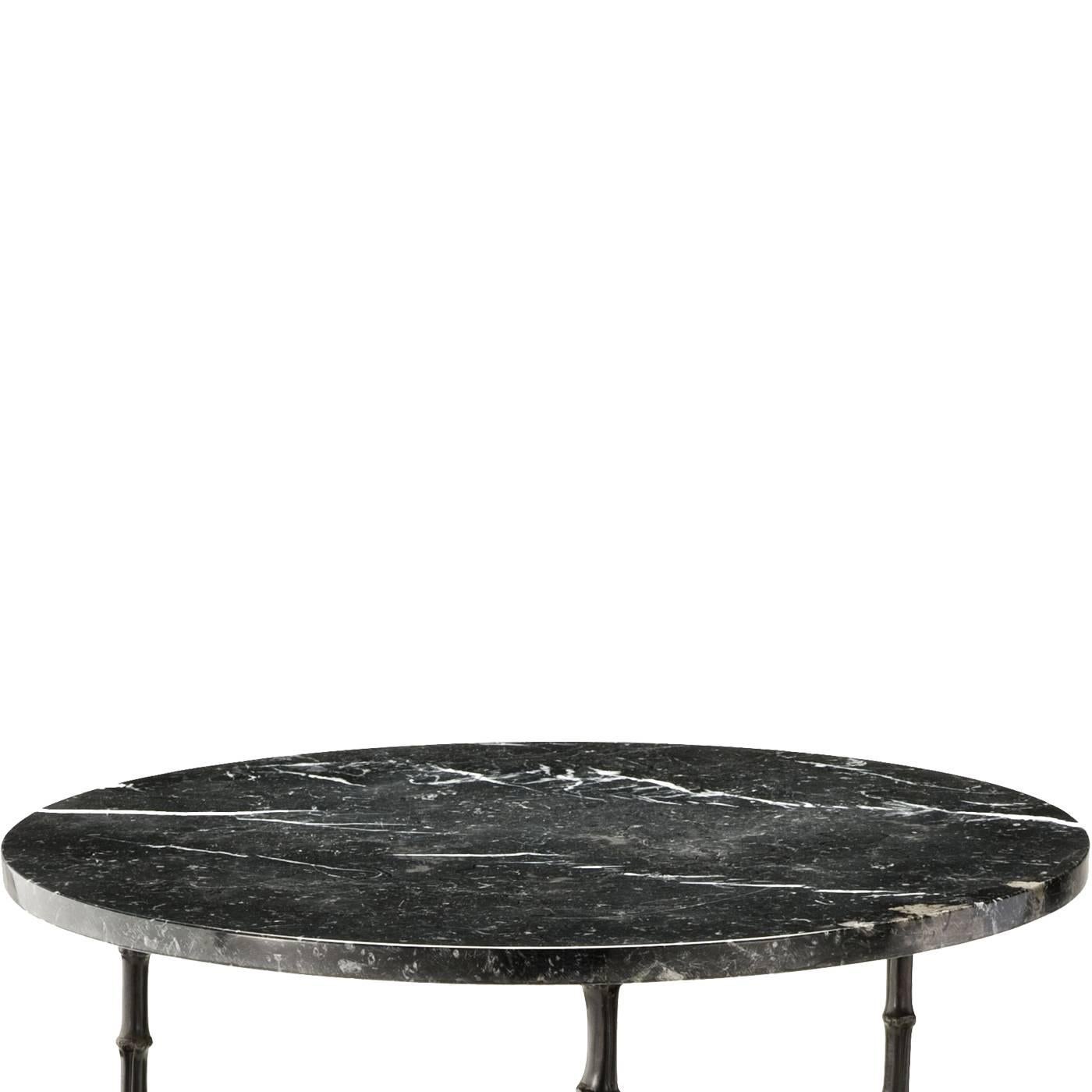 Black burnished brass table by Brass Brothers part of the Bamboo Collection with three feet that resemble the trunk of the plant for their natural effect. The base of the table is in black Marquina marble.