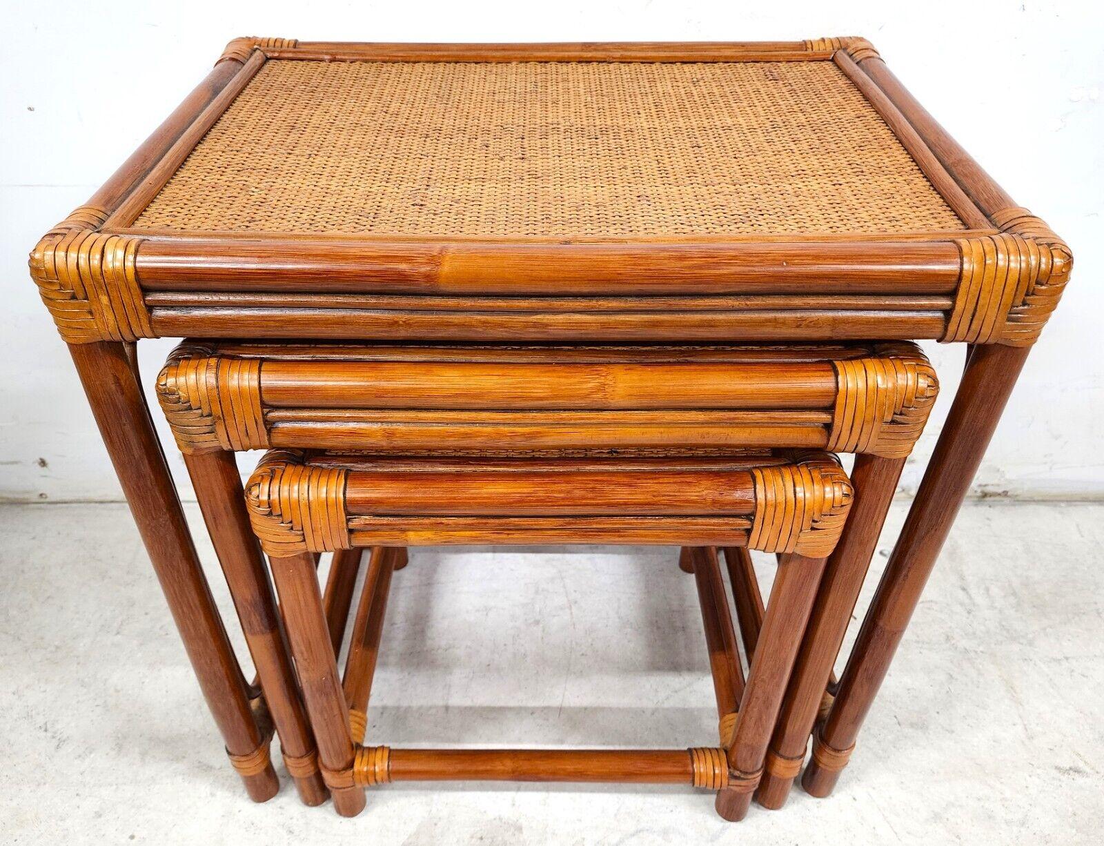 For FULL item description be sure to click on CONTINUE READING at the bottom of this listing.

Vintage set of 3 bamboo nesting tables 
With leather rattan strapping and wicker tops

Approximate measurements in inches
Large: 22