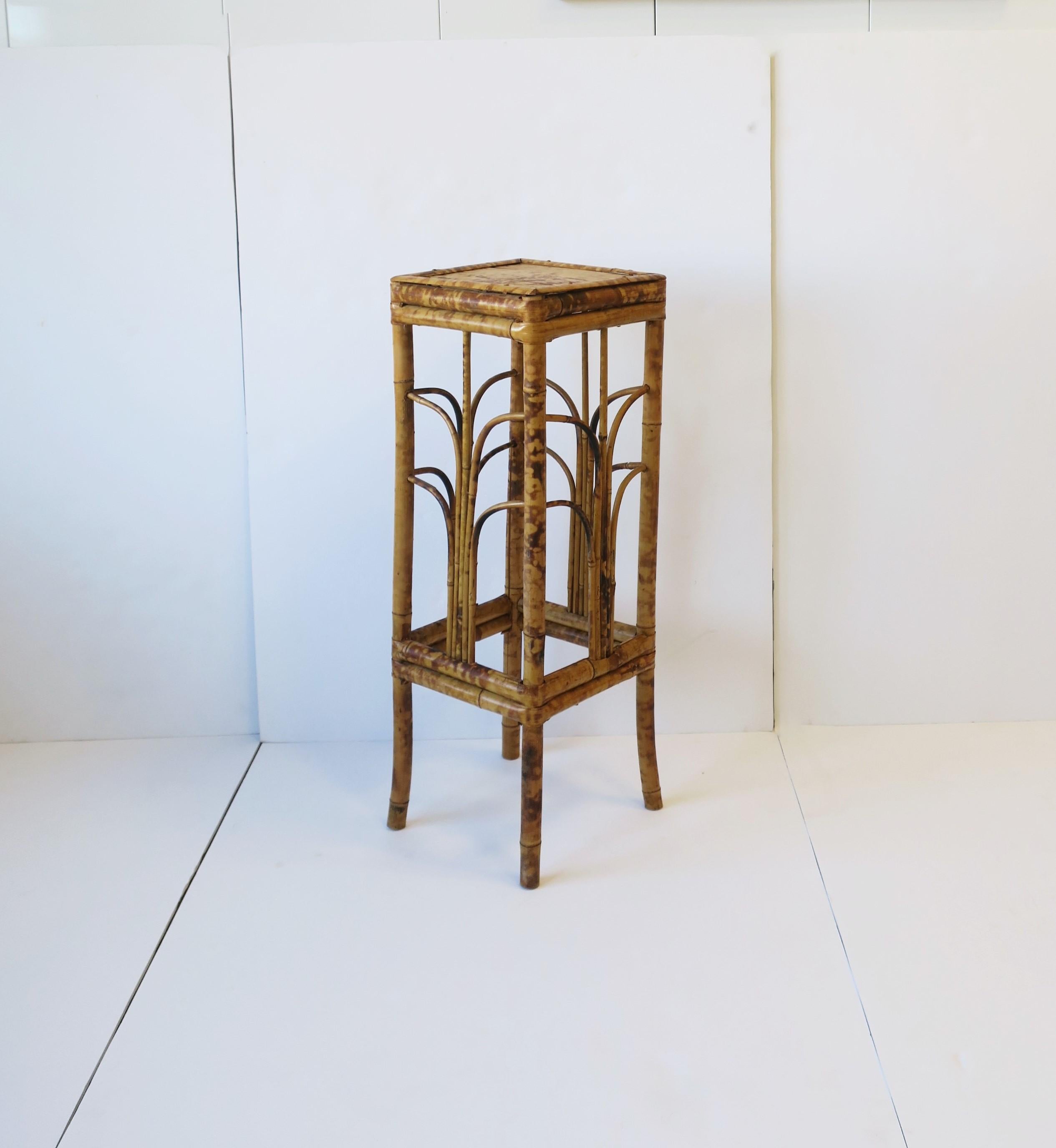 A bamboo pedestal column stand table in the Art Deco Modern style, circa 1970s. A handcrafted piece with Art Deco Modern lines. Use to display a plant, books, vase, urn, etc. 

Dimensions include: 
28.25