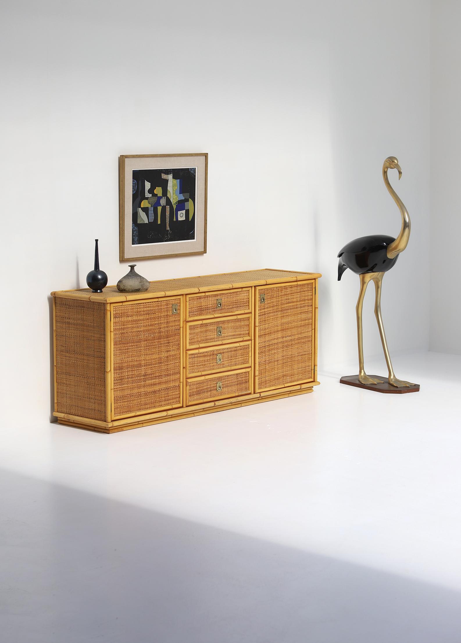 Beautiful wicker sideboard by Dal Vera, Italy that brings summer into your interior. This Rattan and wicker sideboard could be perfectly part of a Magnum Pi interior, where Tom Selleck drinks his cocktail on a sunday afternoon. Dal Vera is well