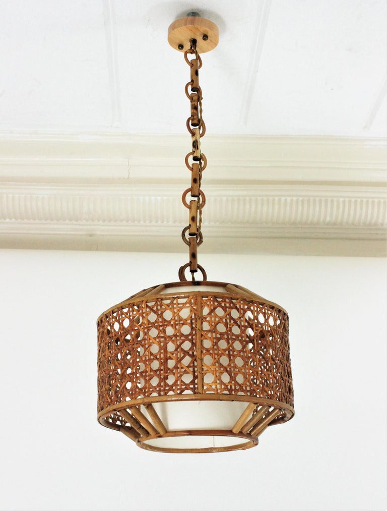 Bamboo Rattan and Wicker Weave Drum Pendant Light or Lantern For Sale