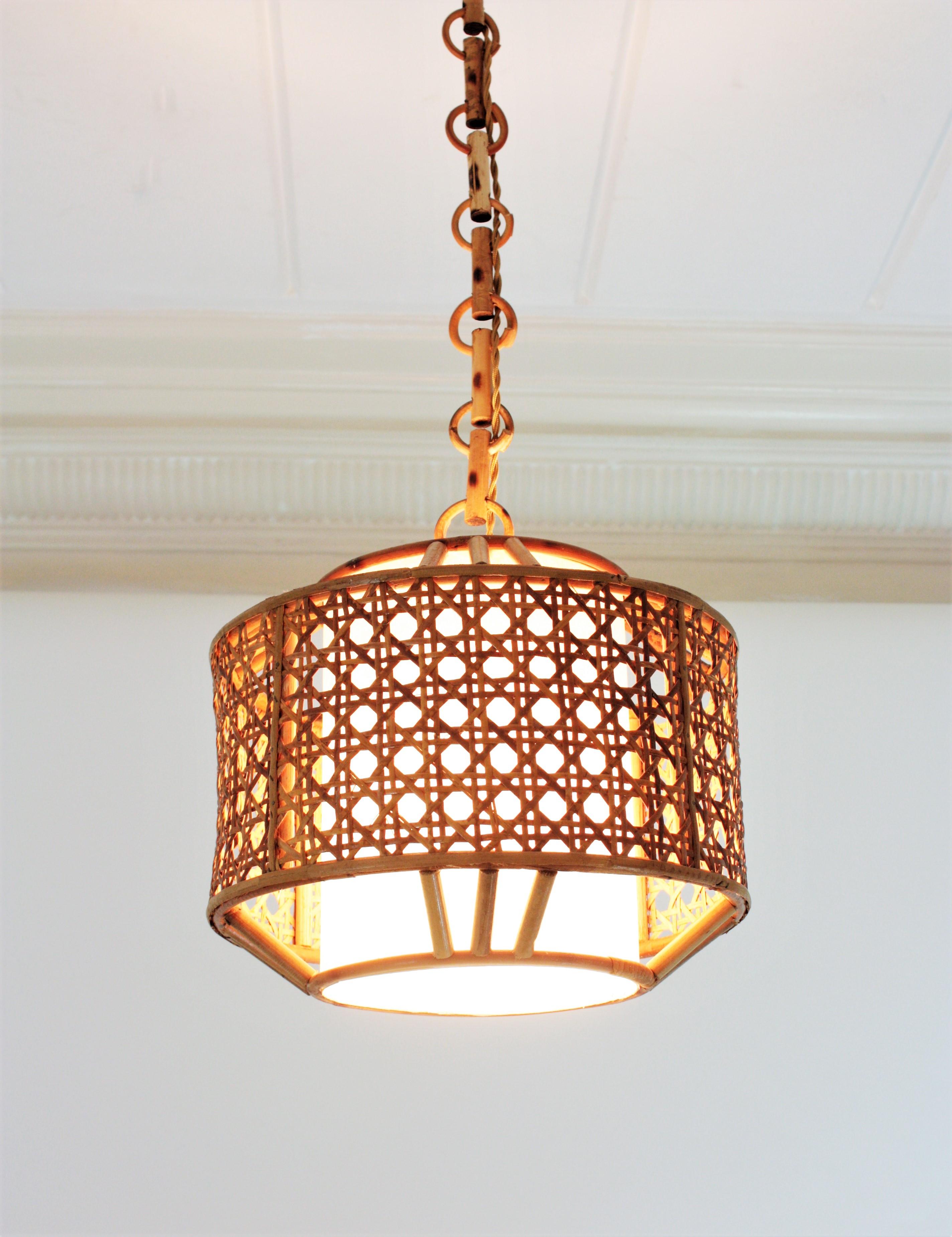 Hand-Crafted Bamboo Rattan and Wicker Weave Drum Pendant Light or Lantern  For Sale