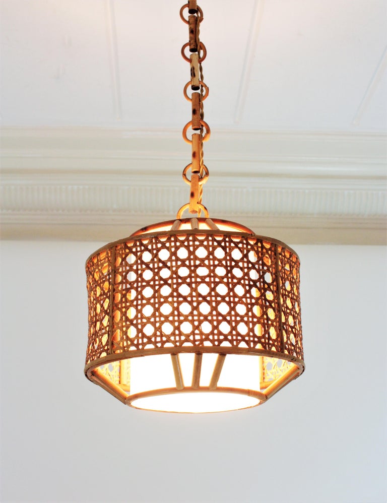Bamboo Rattan and Wicker Weave Drum Pendant Light or Lantern For Sale