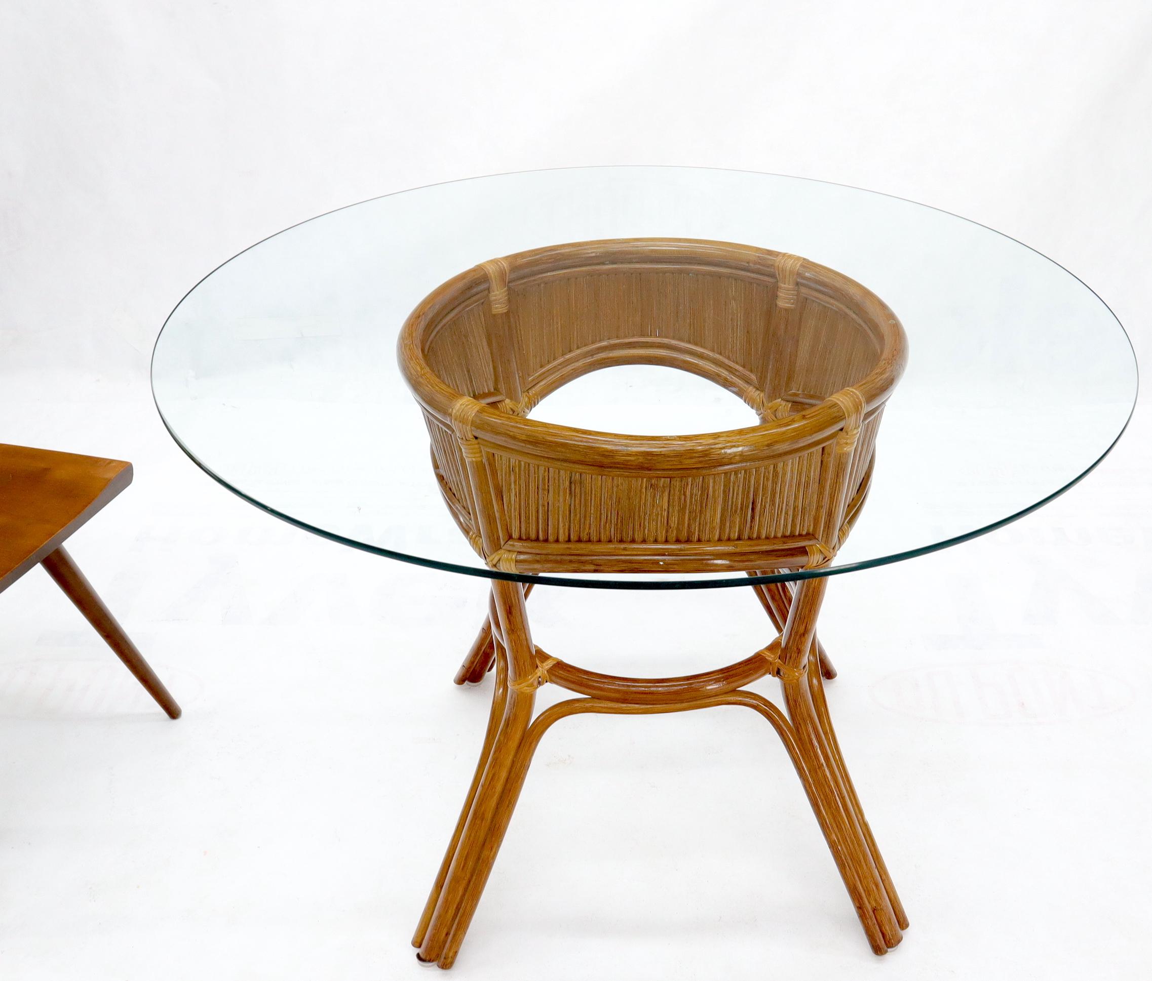 Bamboo rattan base round glass top dining dinette table.