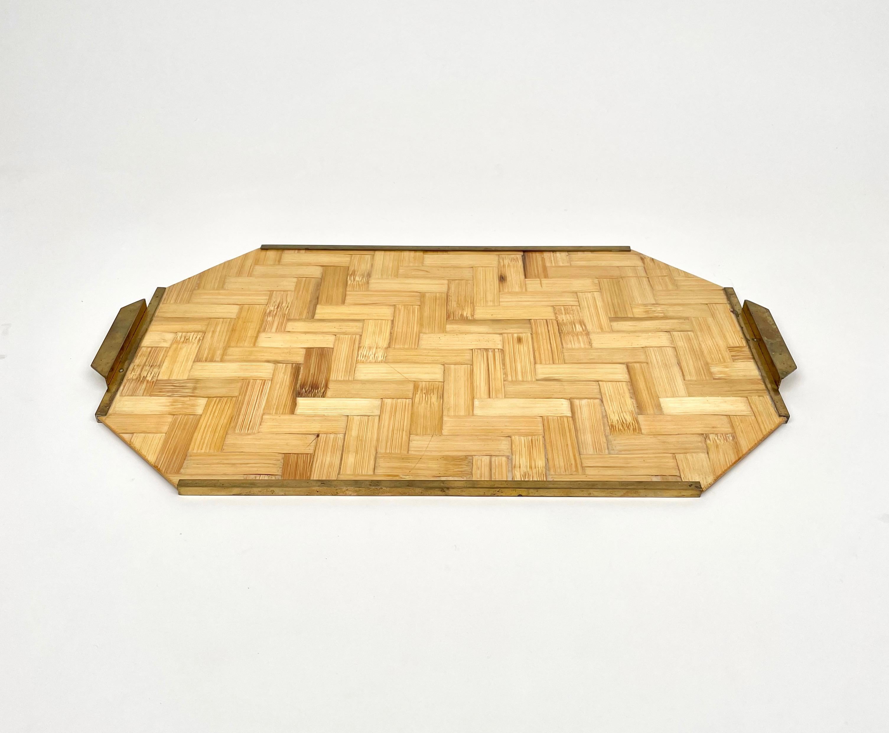 Serving tray in rattan bamboo with brass details and handles made in Italy in the 1970s.