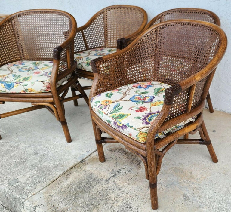 Offering one of our recent palm beach estate fine furniture acquisitions of a
set of (4) vintage bamboo rattan cane dining chairs by WHITECRAFT RATTAN

Approximate Measurements in Inches
32