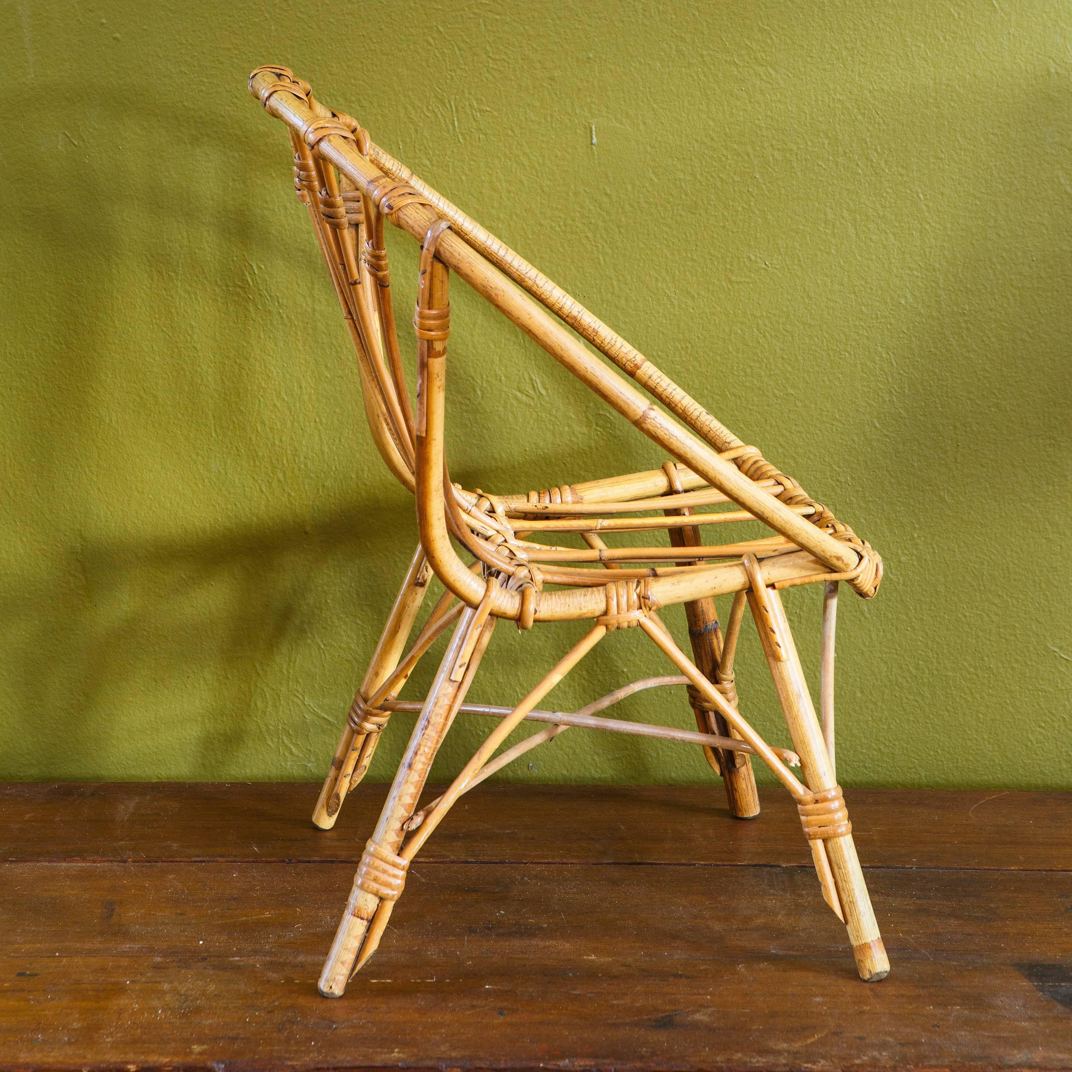 Charming, small bamboo/rattan chair great for a nursery or small child.