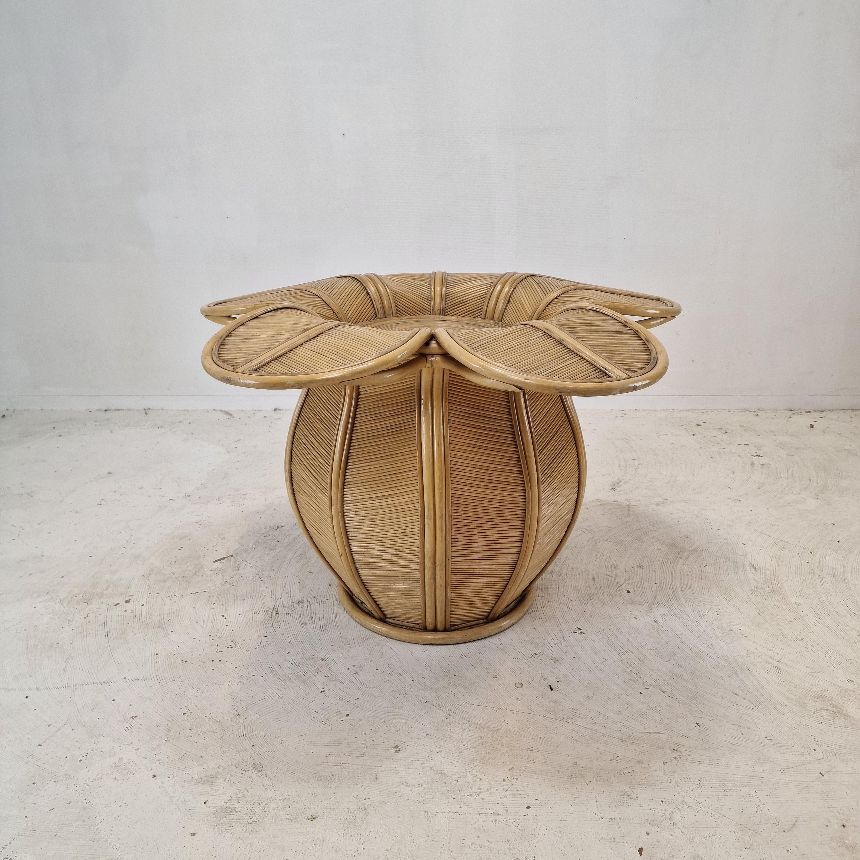 Stunning dining table base, fabricated in France in the early 80's. 
This beautiful and very rare table is made of bamboo and rattan.

Very nice sculptured and solid base, from above it looks like a flower.

This is a one of a kind piece!

Just
