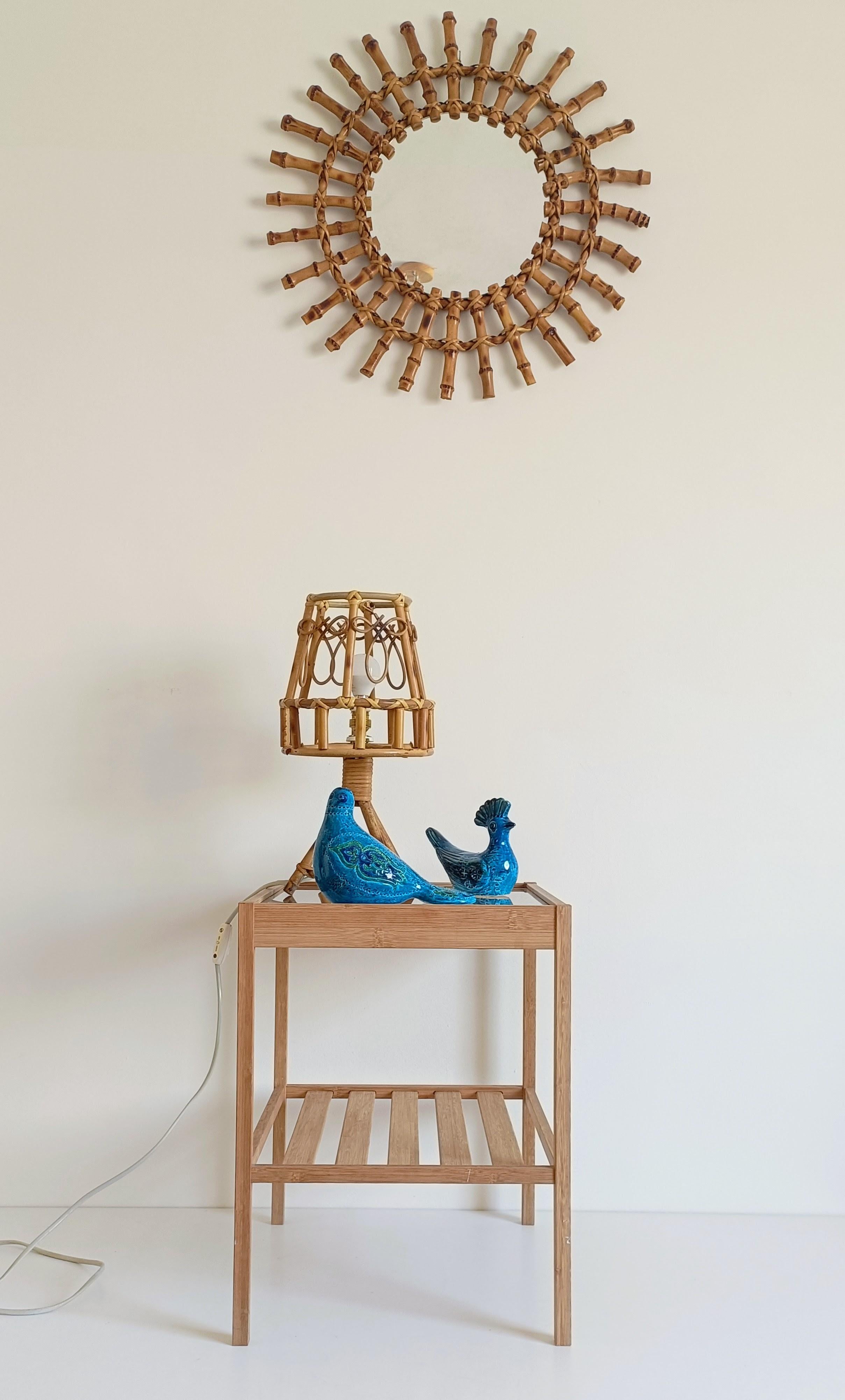 Handmade bamboo and rattan table lamp, crafted in Spain circa 1960s, in the manner of Louis Sognot, Franco Albini, or Vivai del Sud. This elegant piece embodies the natural materials and refined simplicity of mid-century design, making it an ideal