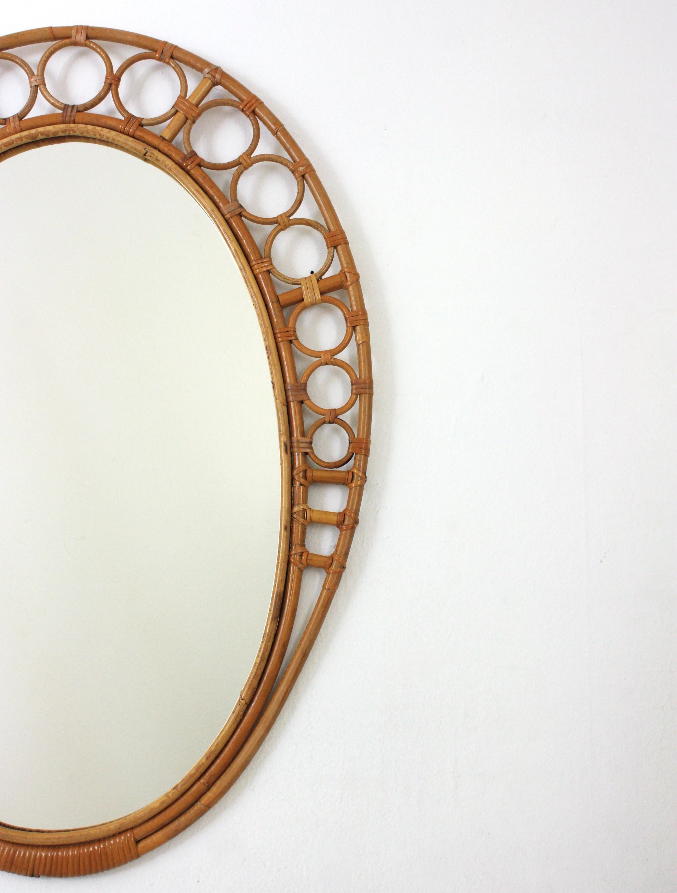 Spanish Bamboo Rattan Oval Mirror with Rings Frame, 1960s For Sale