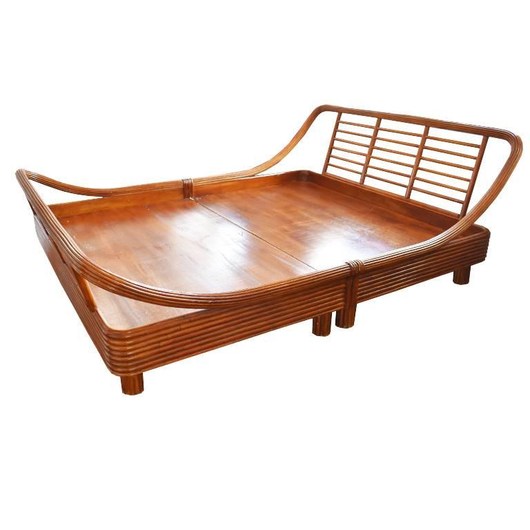 Beautiful midcentury or art deco style bedroom set. Includes one queen size bed frame. It is modeled after the smaller beds often found in the post-war era in the style of Faul Frankl. The piece features a rounded headboard. A truly rare item.