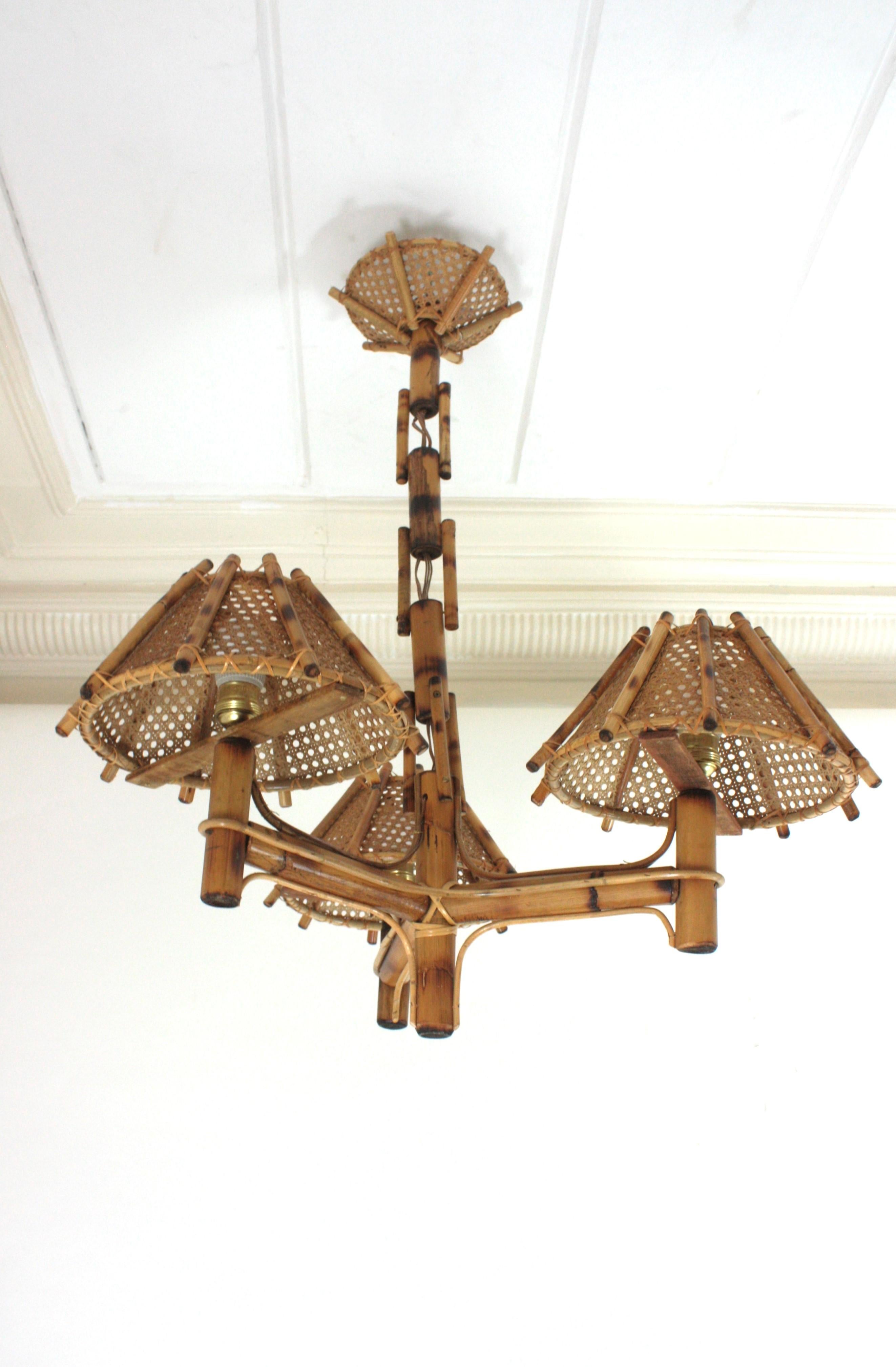 Hand-Crafted Bamboo Rattan Three-Arm Chandelier with Wicker Conical Lampshades For Sale