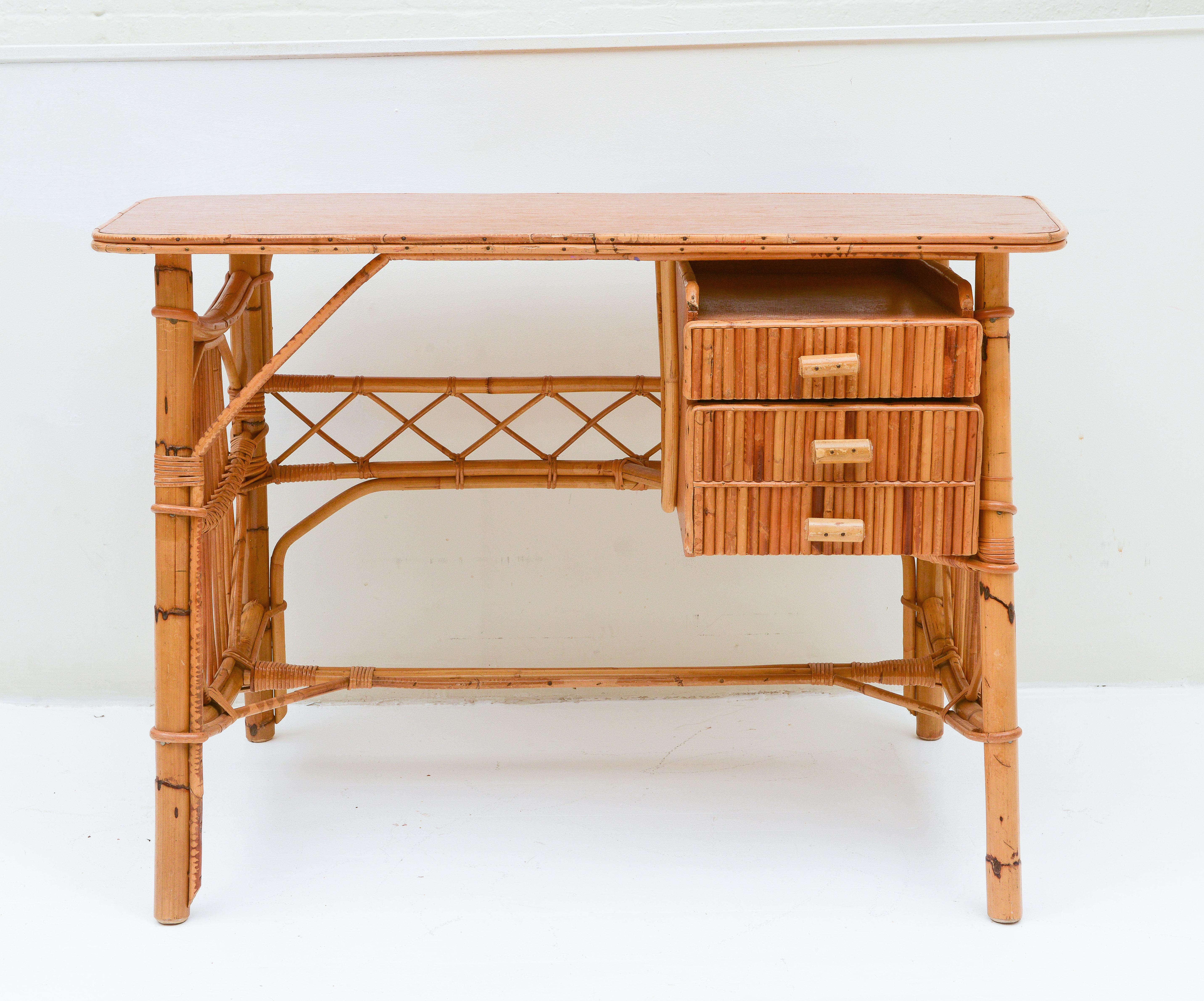 Beautiful and Chic bamboo desk. Fantastic detailing with 3 drawers. Imported from France. 1970's.