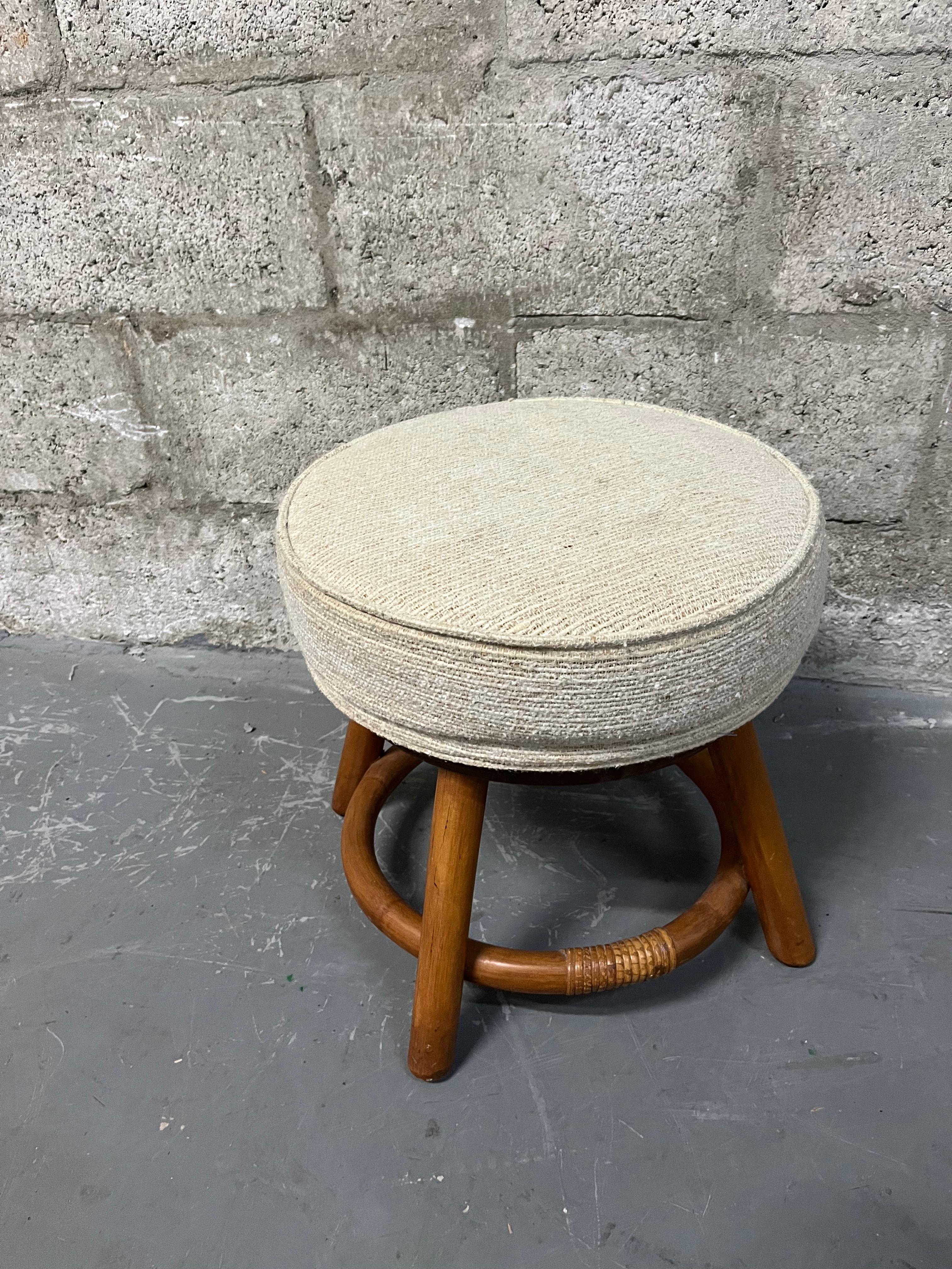 Mid-Century Modern Bamboo Rattan Wicker Swivel Footstool in the Paul Frankl's Style. Circa 1970s  For Sale