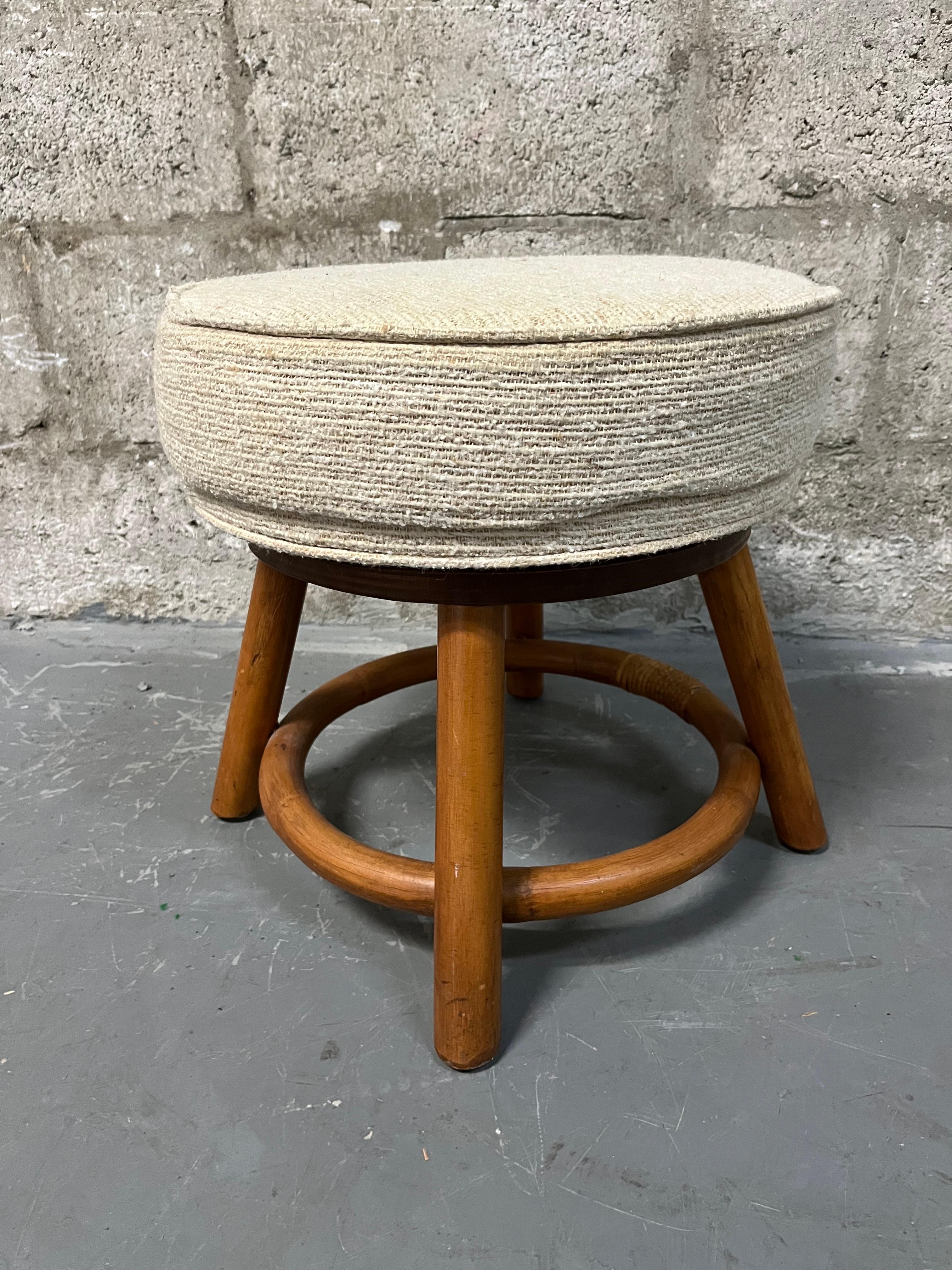 American Bamboo Rattan Wicker Swivel Footstool in the Paul Frankl's Style. Circa 1970s  For Sale