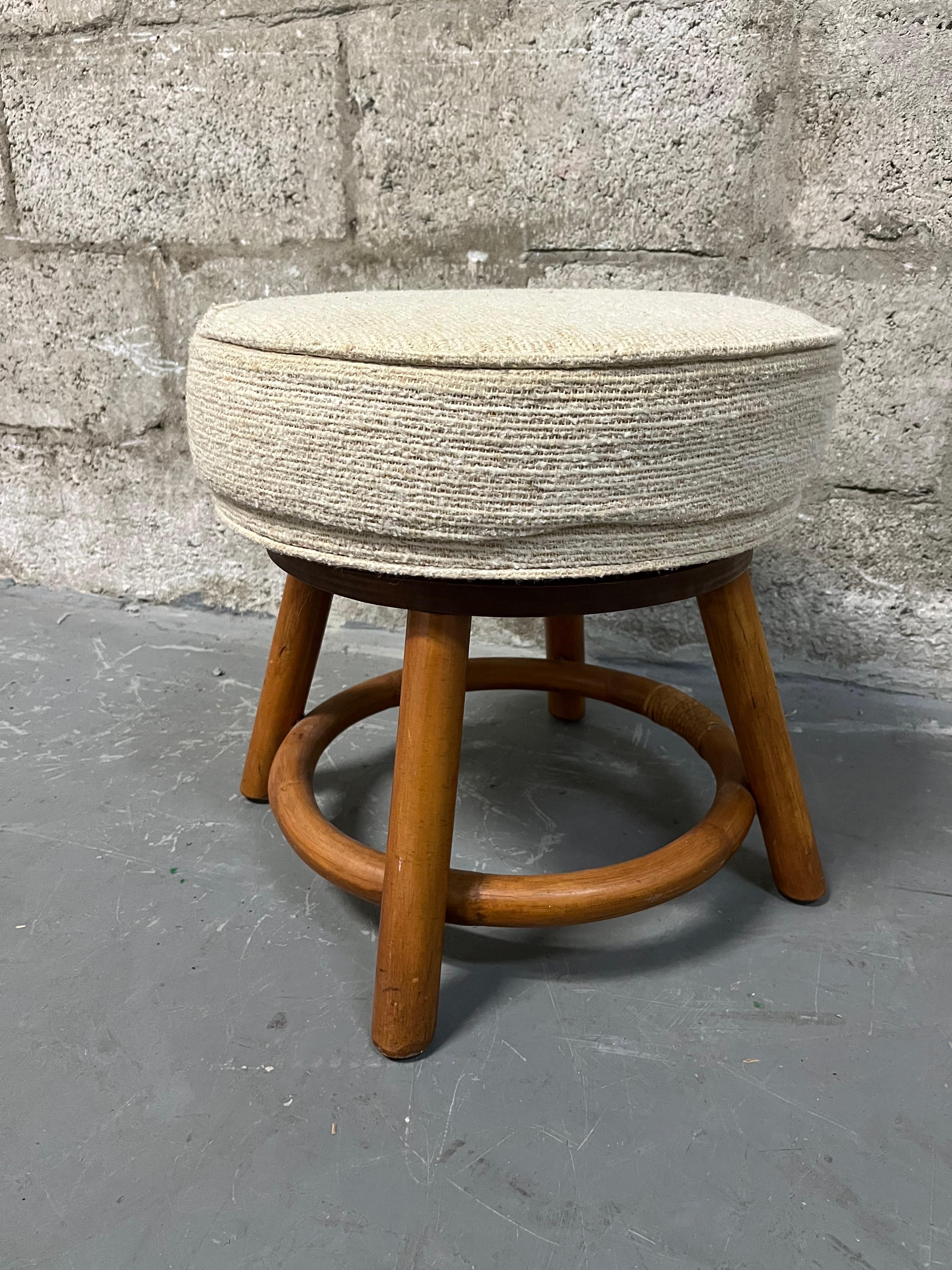 Bamboo Rattan Wicker Swivel Footstool in the Paul Frankl's Style. Circa 1970s  In Good Condition For Sale In Miami, FL