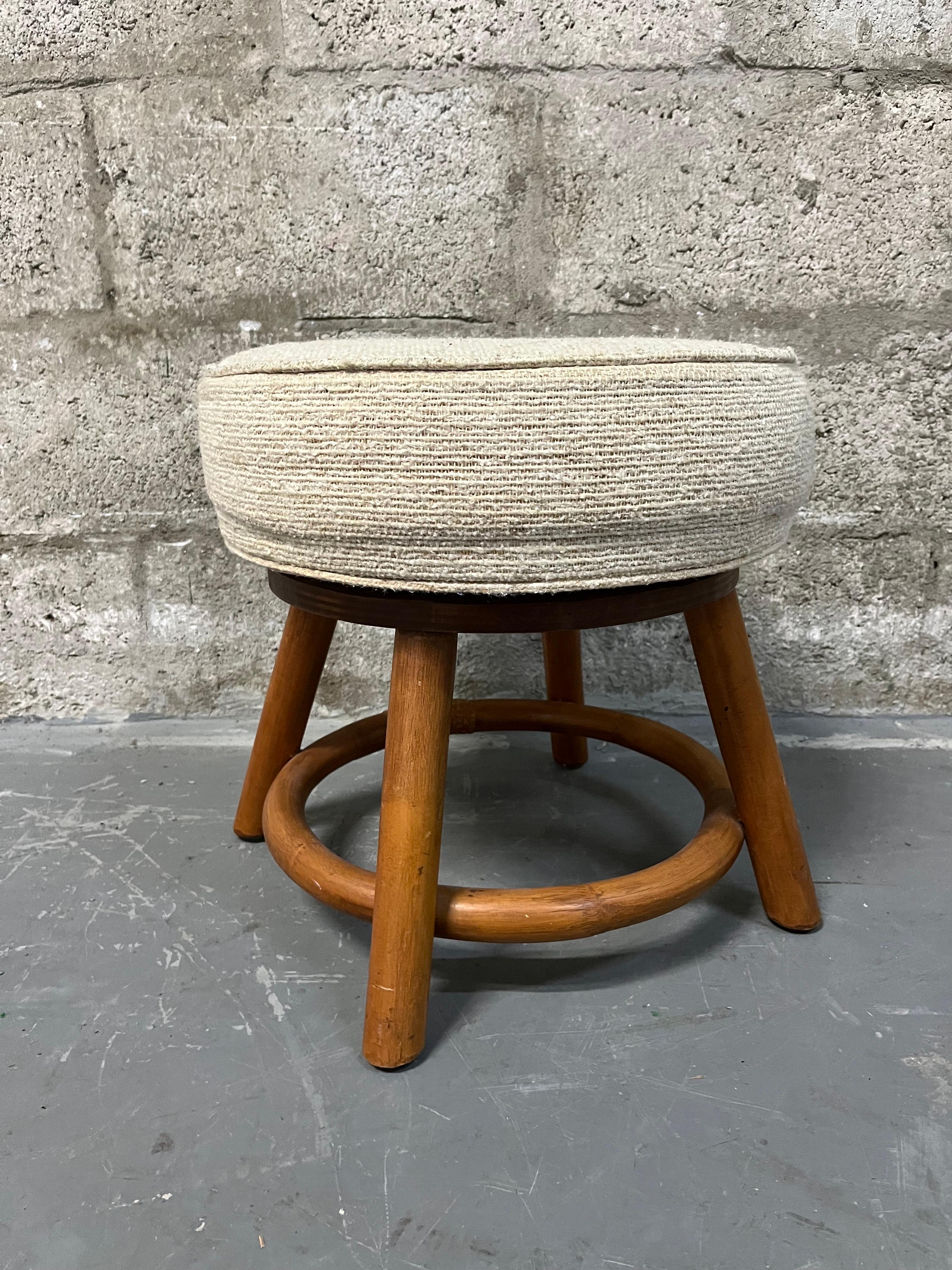Late 20th Century Bamboo Rattan Wicker Swivel Footstool in the Paul Frankl's Style. Circa 1970s  For Sale