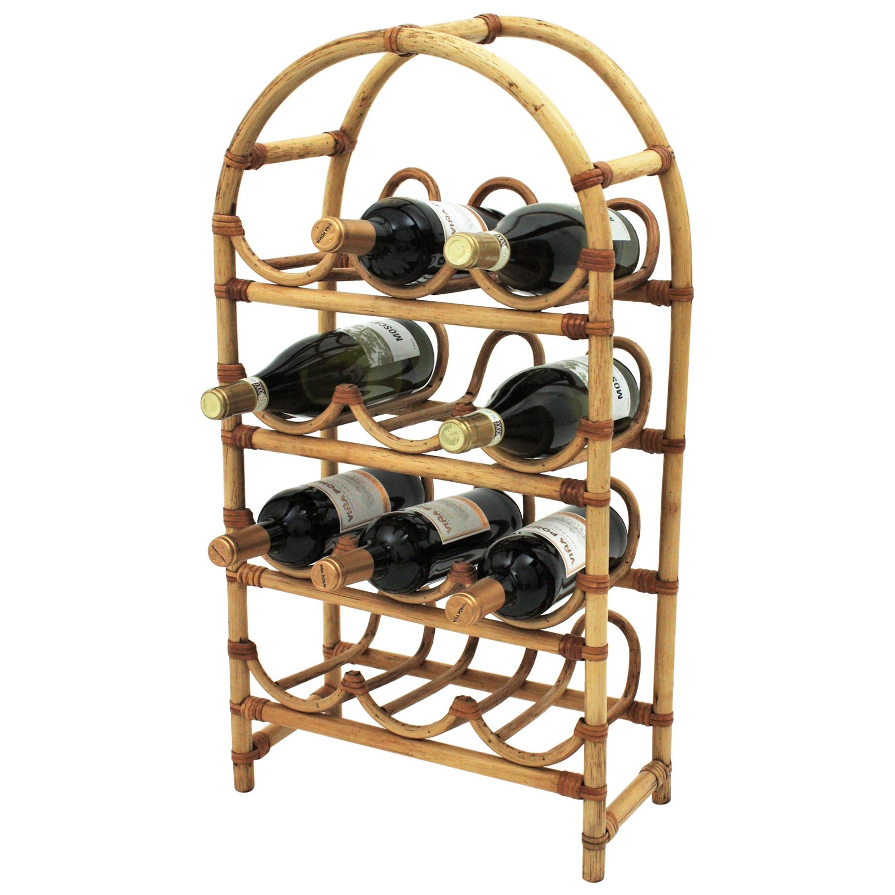 Eye-catching rattan / bamboo wine stand for 12 bottles. Spain, 1960s
This cool bottle rack allows to storage 12 bottles.
It will be a nice addition to a kitchen, celler or placed near a dining area.
Interesting in a beach house or countryside house